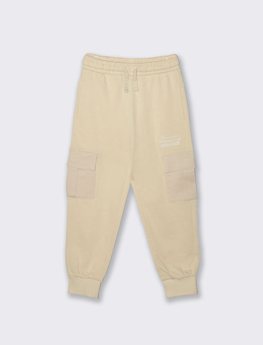 Jogger con tasconi. - Beige