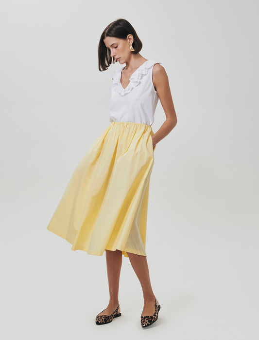 Introducing a long skirt designed for the modern woman, blending comfort and style effortlessly. Fea - Yellow