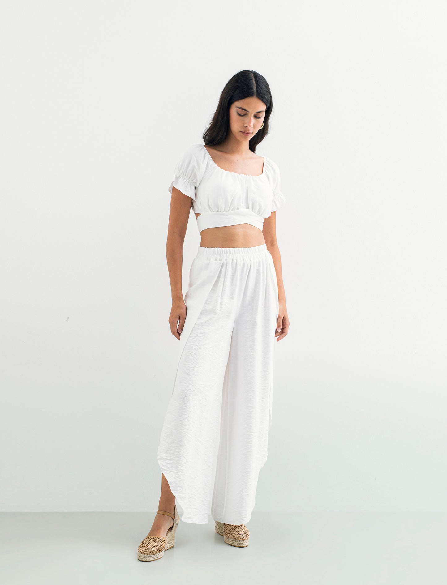 Pantalone a palazzo con elastico in vita - Bianco