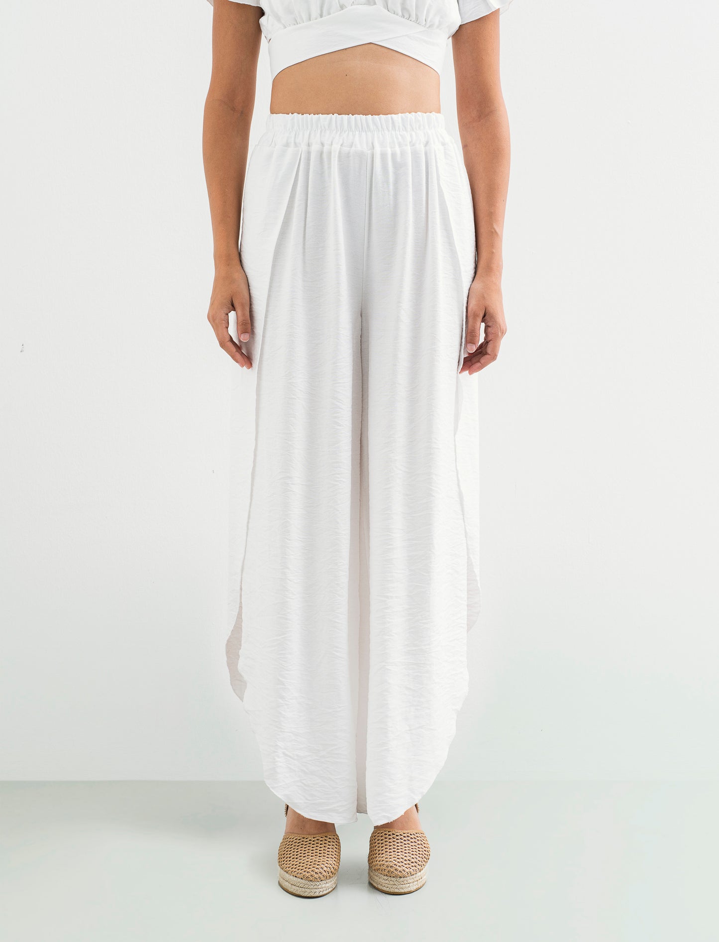 Pantalone a palazzo con elastico in vita - Bianco