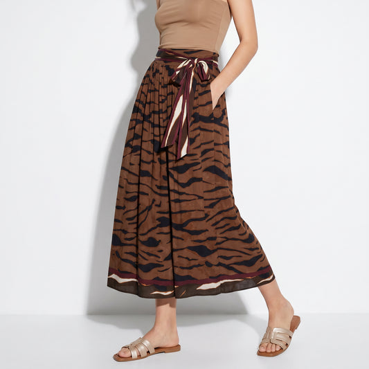 Elevate your wardrobe with this stunning long skirt designed for the modern woman. Featuring a match - 