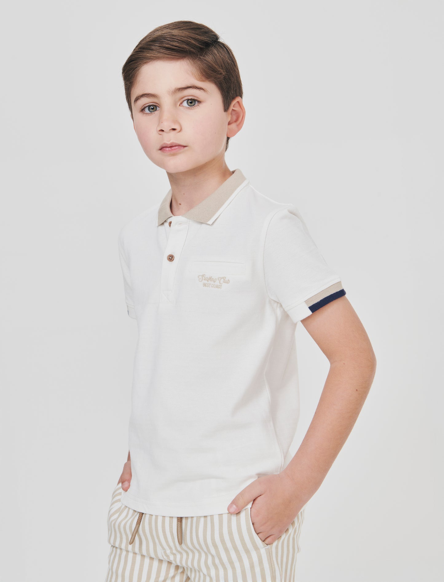 Polo in piquet con taschino elegante - Bianco latte