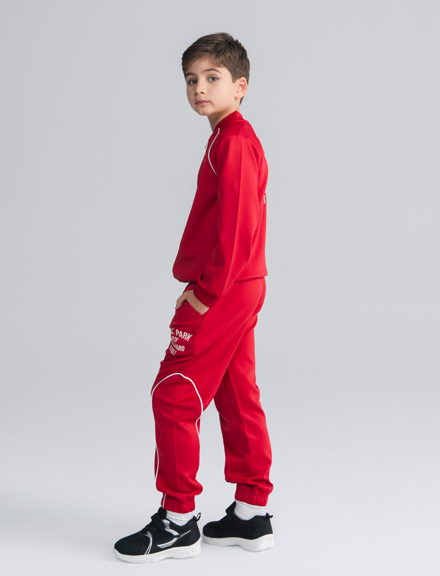 Jogger in felpa leggera con stampa frontale - Rosso india