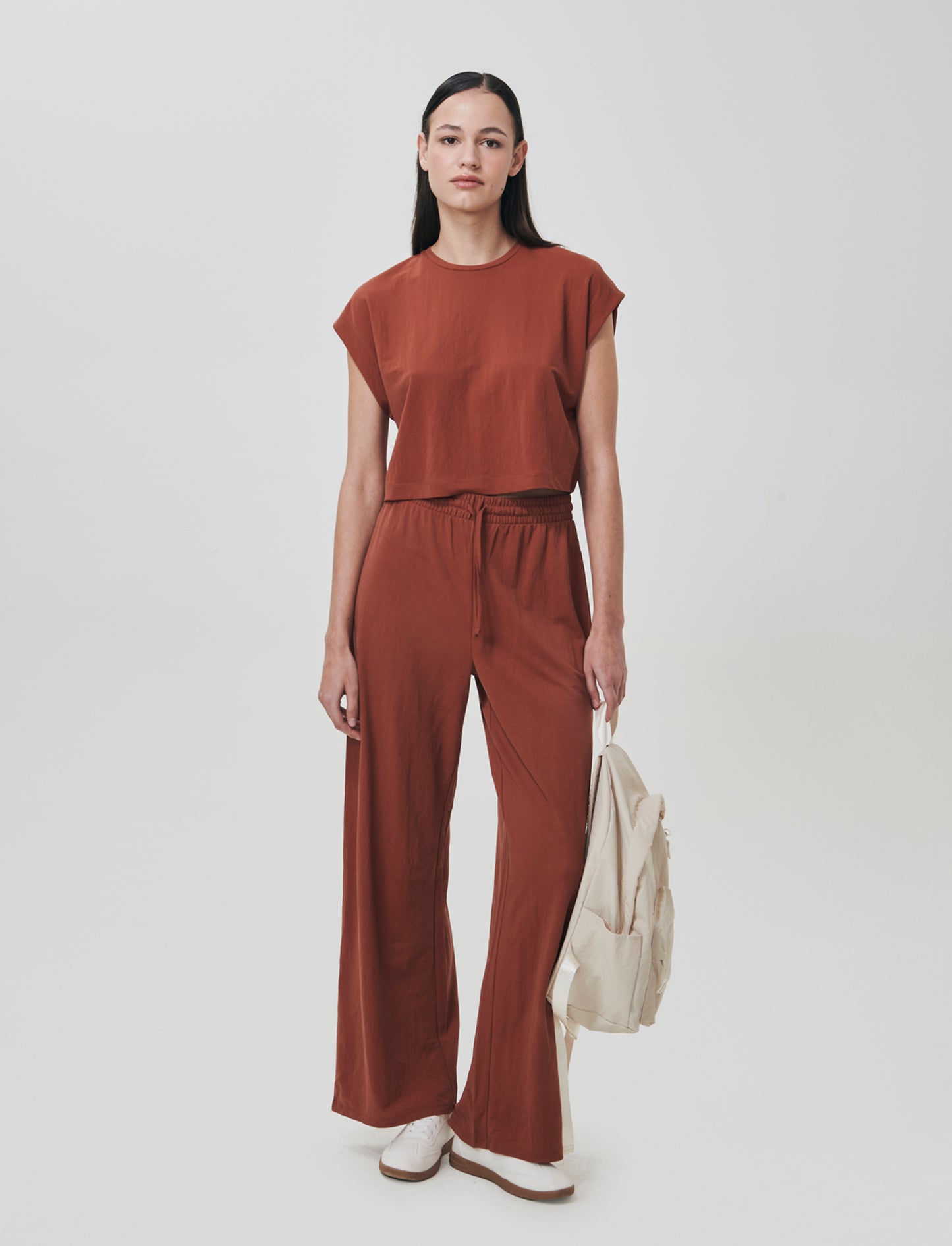 Elevate your everyday wardrobe with this essential basic t-shirt. Designed for women, it features a - Orange