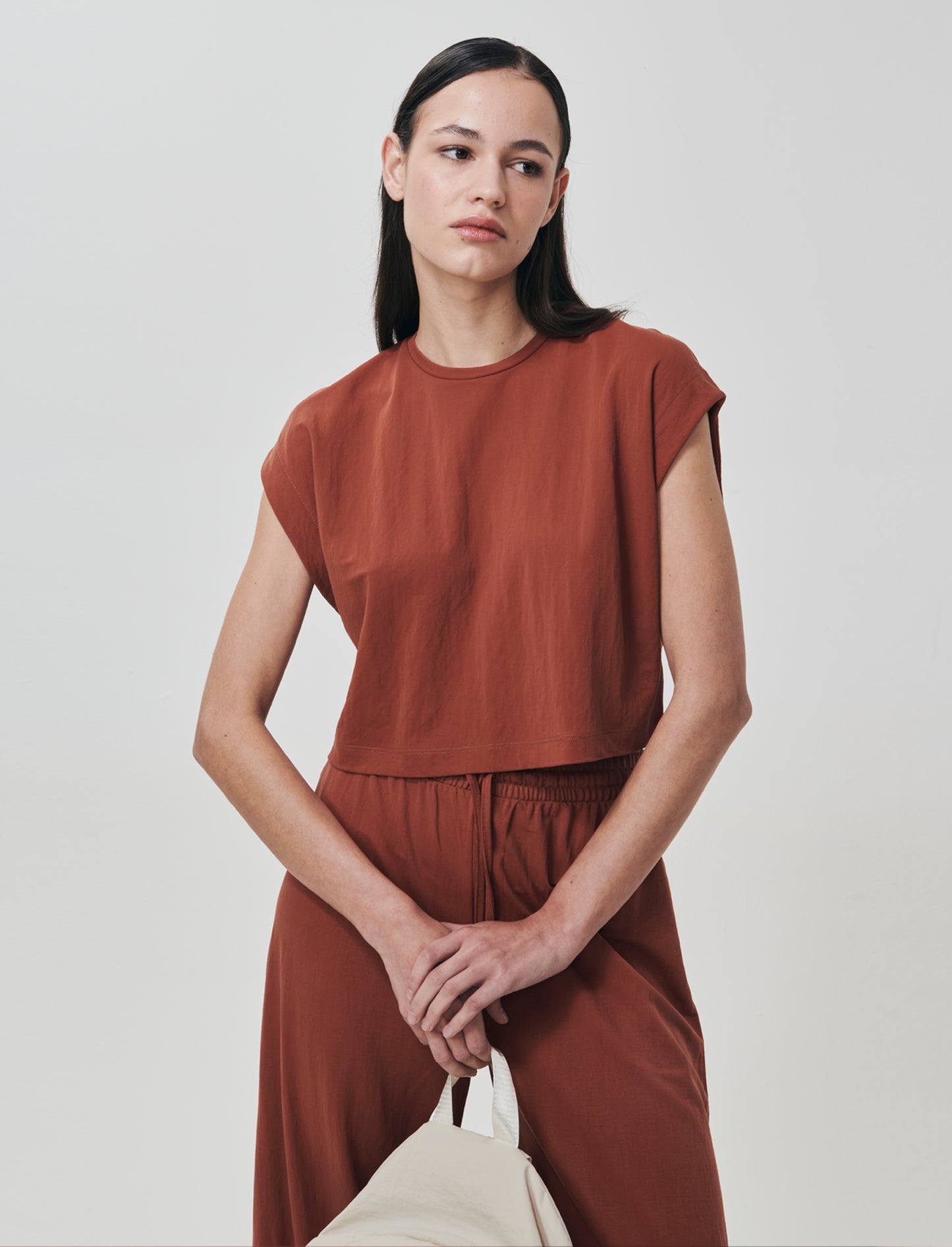 Elevate your everyday wardrobe with this essential basic t-shirt. Designed for women, it features a - Orange