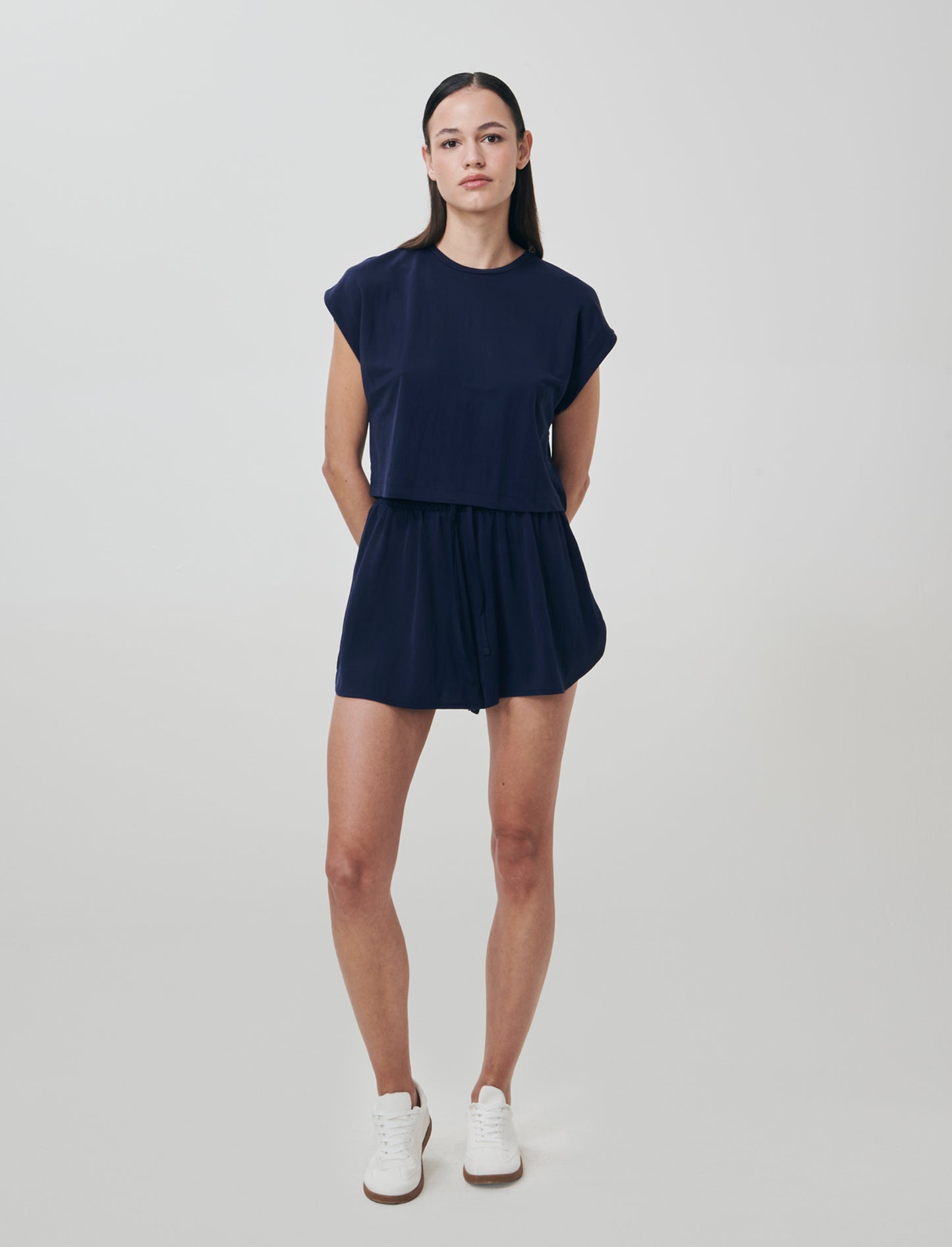 Introducing the perfect blend of comfort and style for women: these short shorts feature a rounded h - Blue