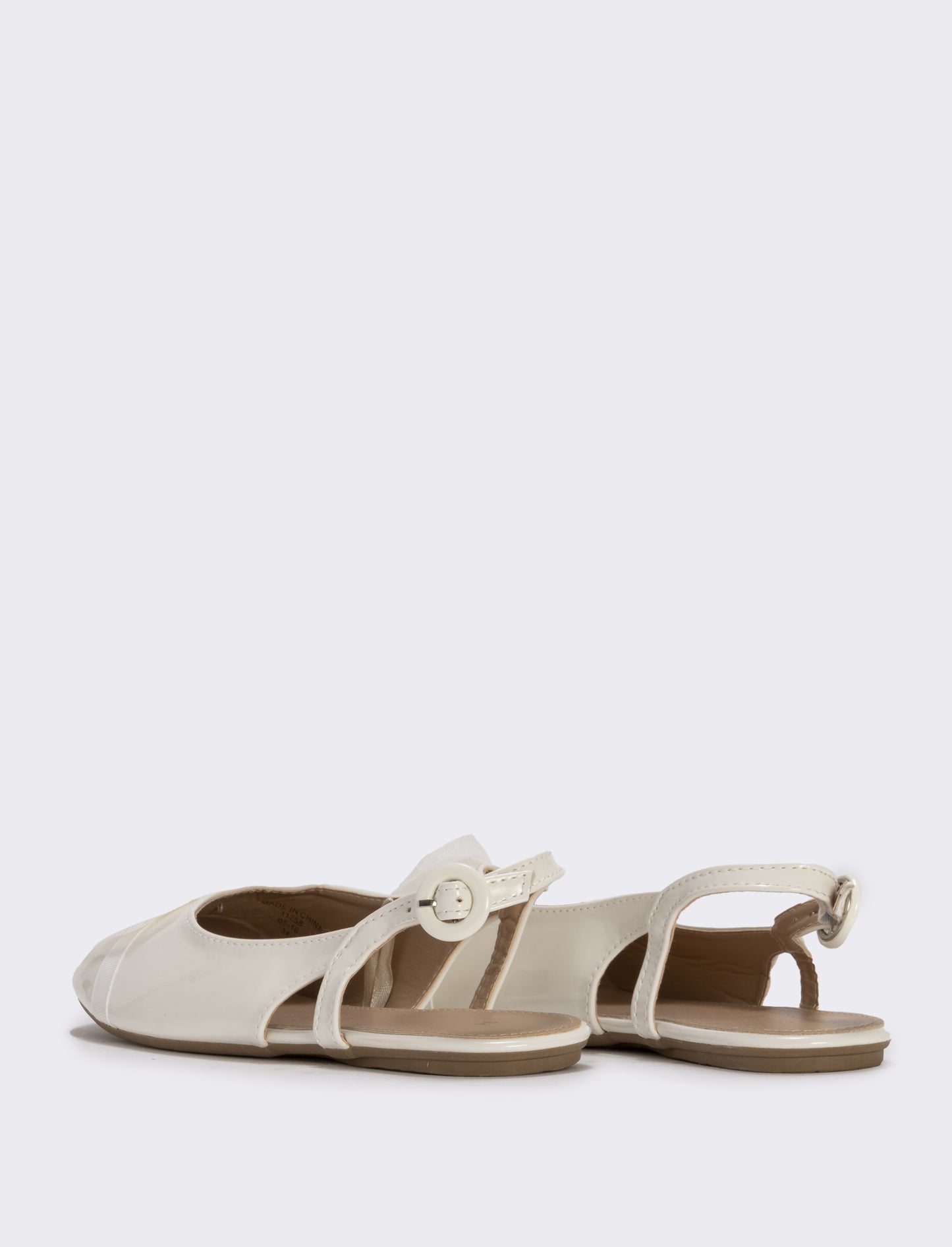 Slingback con fiocco in tulle da bambina. - Bianco panna