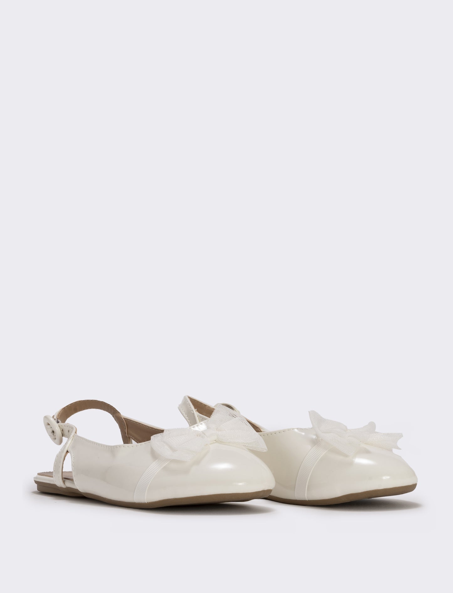 Slingback con fiocco in tulle da bambina. - Bianco panna