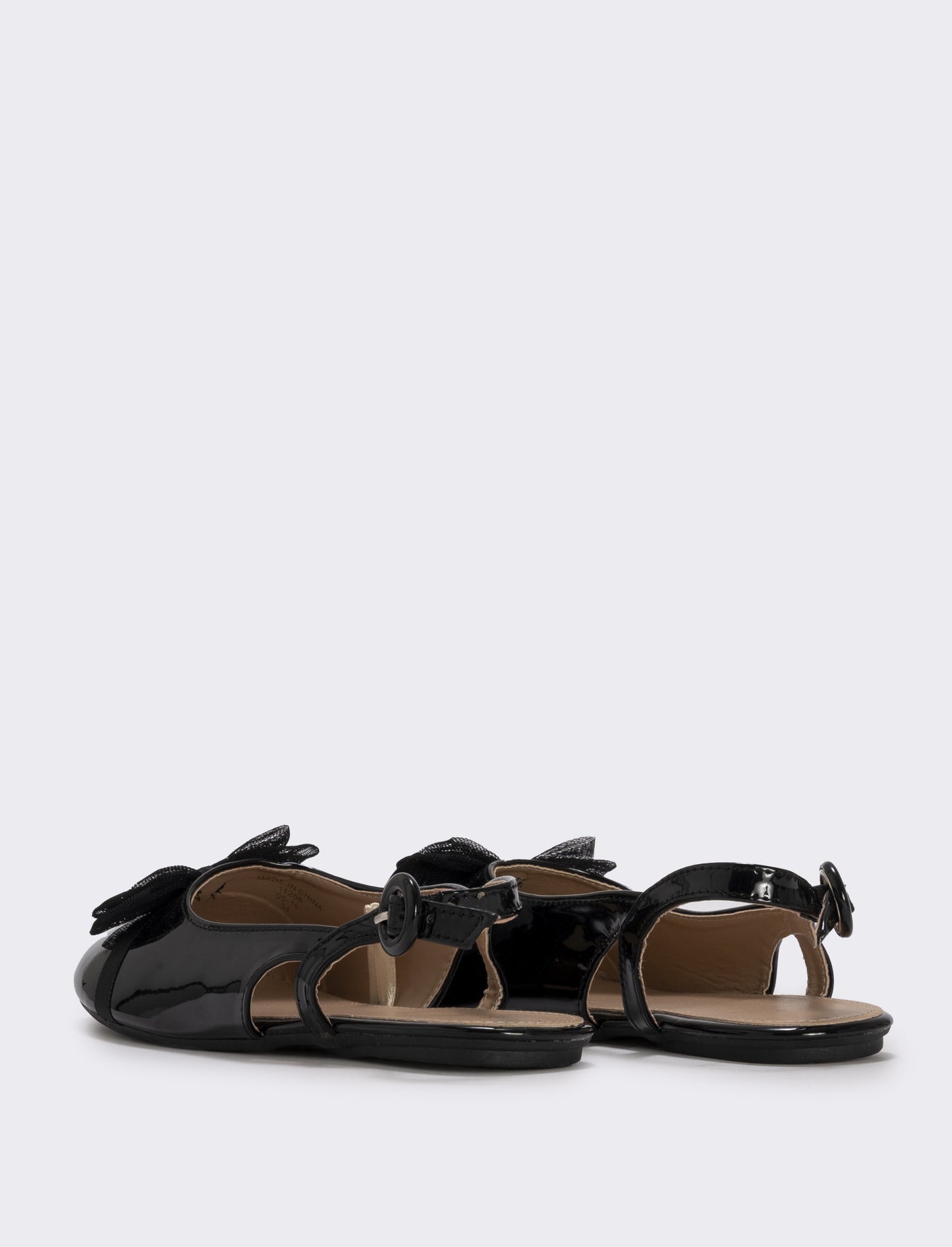 Slingback con fiocco in tulle da bambina. - Nero