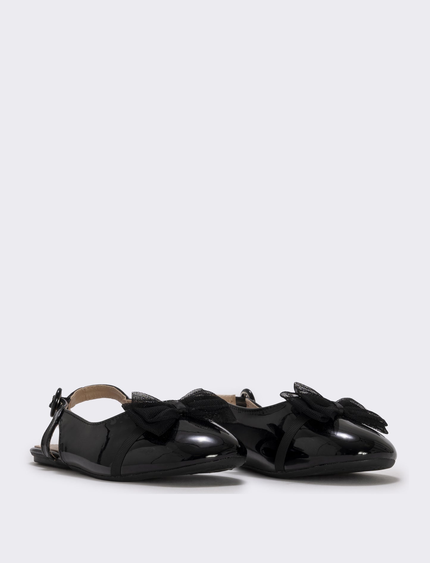 Slingback con fiocco in tulle da bambina. - Nero