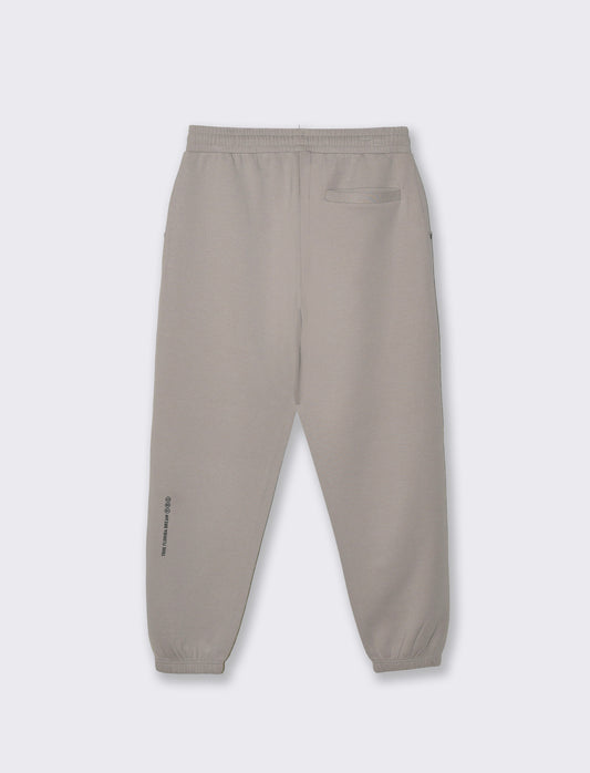 Pantaloni jogger in interlock con tasche - Sabbia
