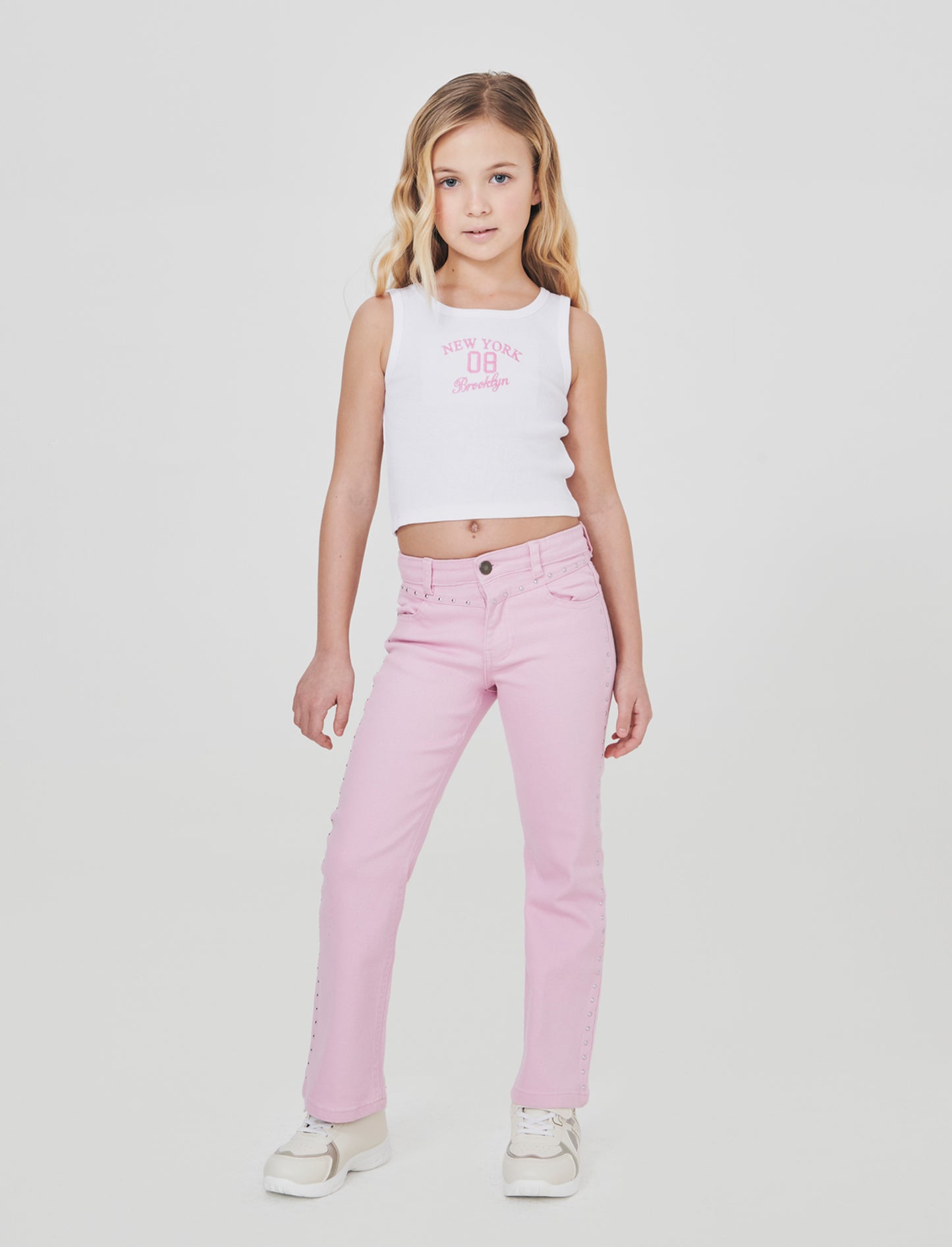 Pantalone flare in denim con borchiette - Rosa