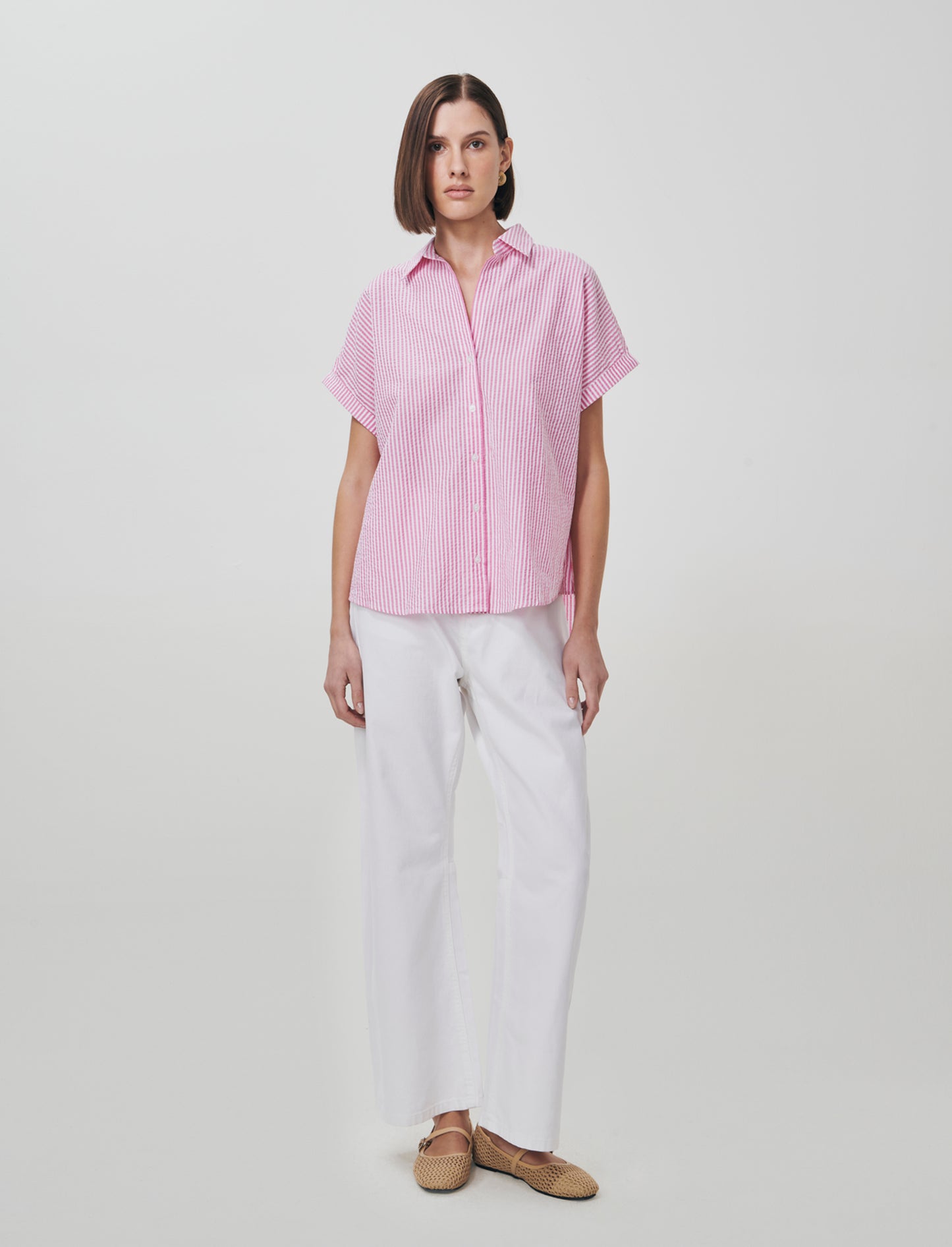 Introducing the Half-Sleeve Shirt with V-Neck, a versatile addition to any woman's wardrobe. This st - 