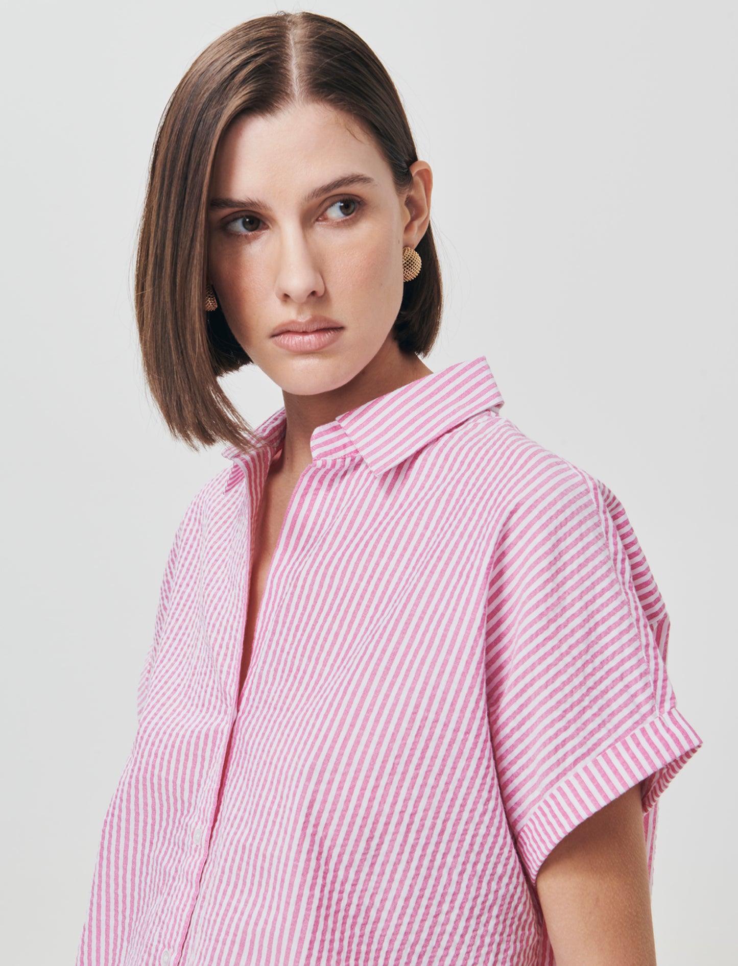 Introducing the Half-Sleeve Shirt with V-Neck, a versatile addition to any woman's wardrobe. This st - 