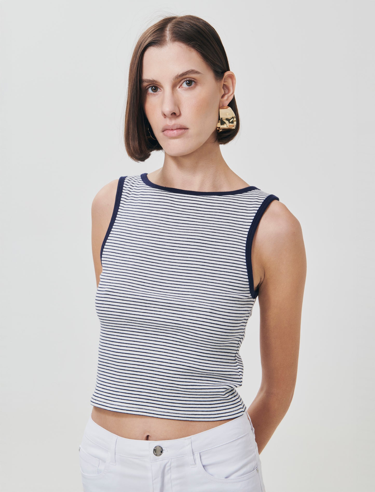 Elevate your wardrobe with this stunning ribbed tank top, designed specifically for women who apprec - 