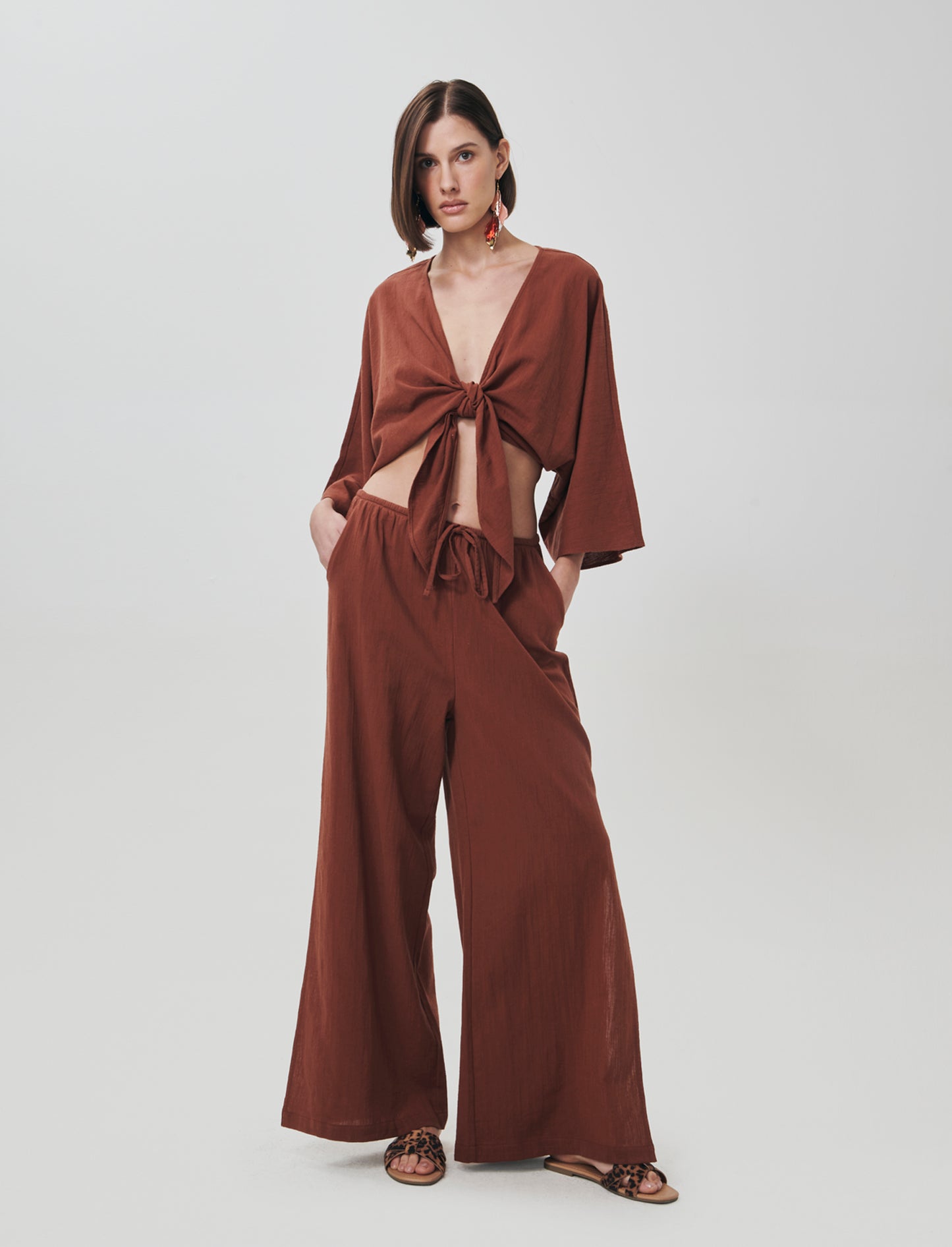 Introducing the perfect blend of comfort and style: wide-leg pants designed specifically for women. - Orange