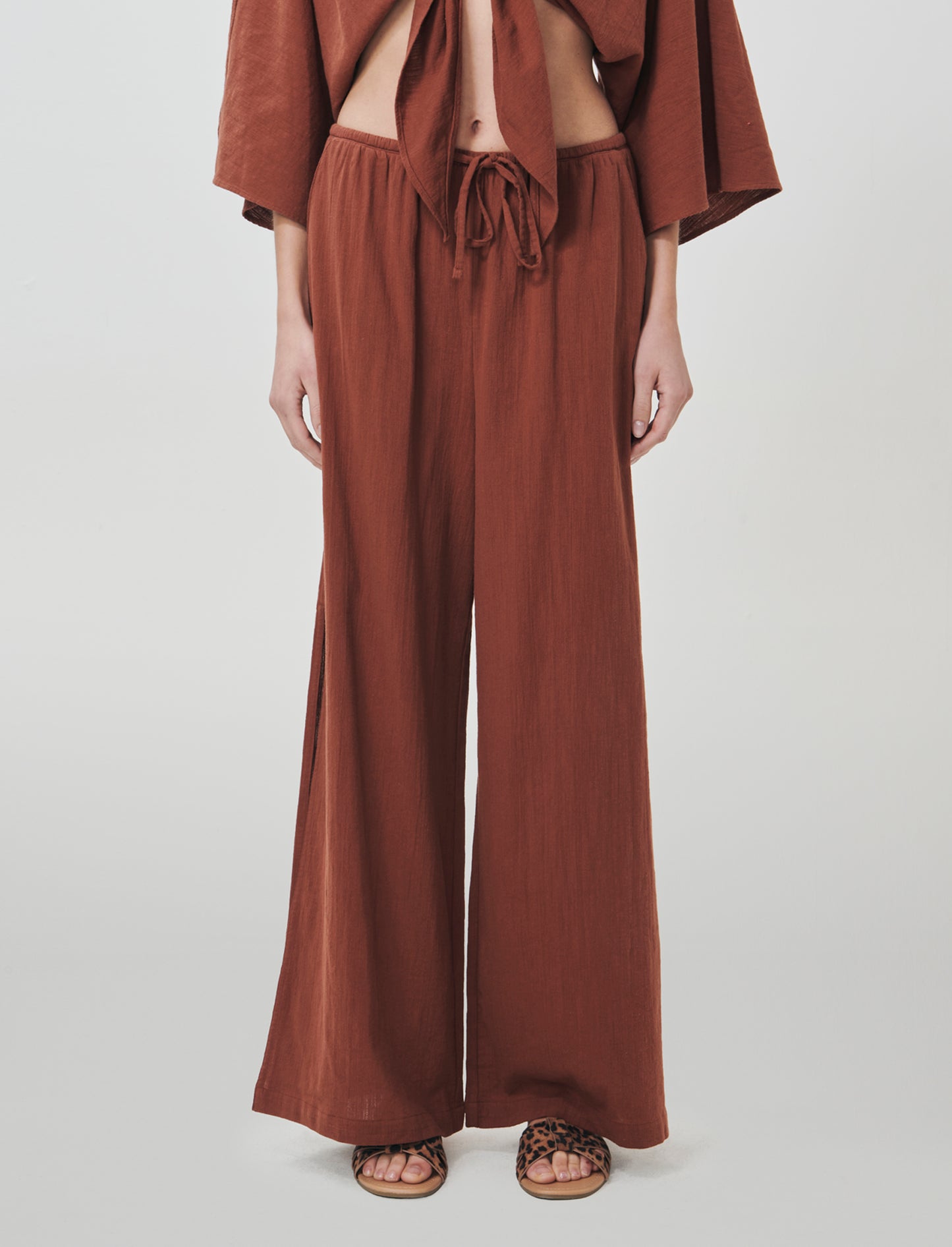 Introducing the perfect blend of comfort and style: wide-leg pants designed specifically for women. - Orange
