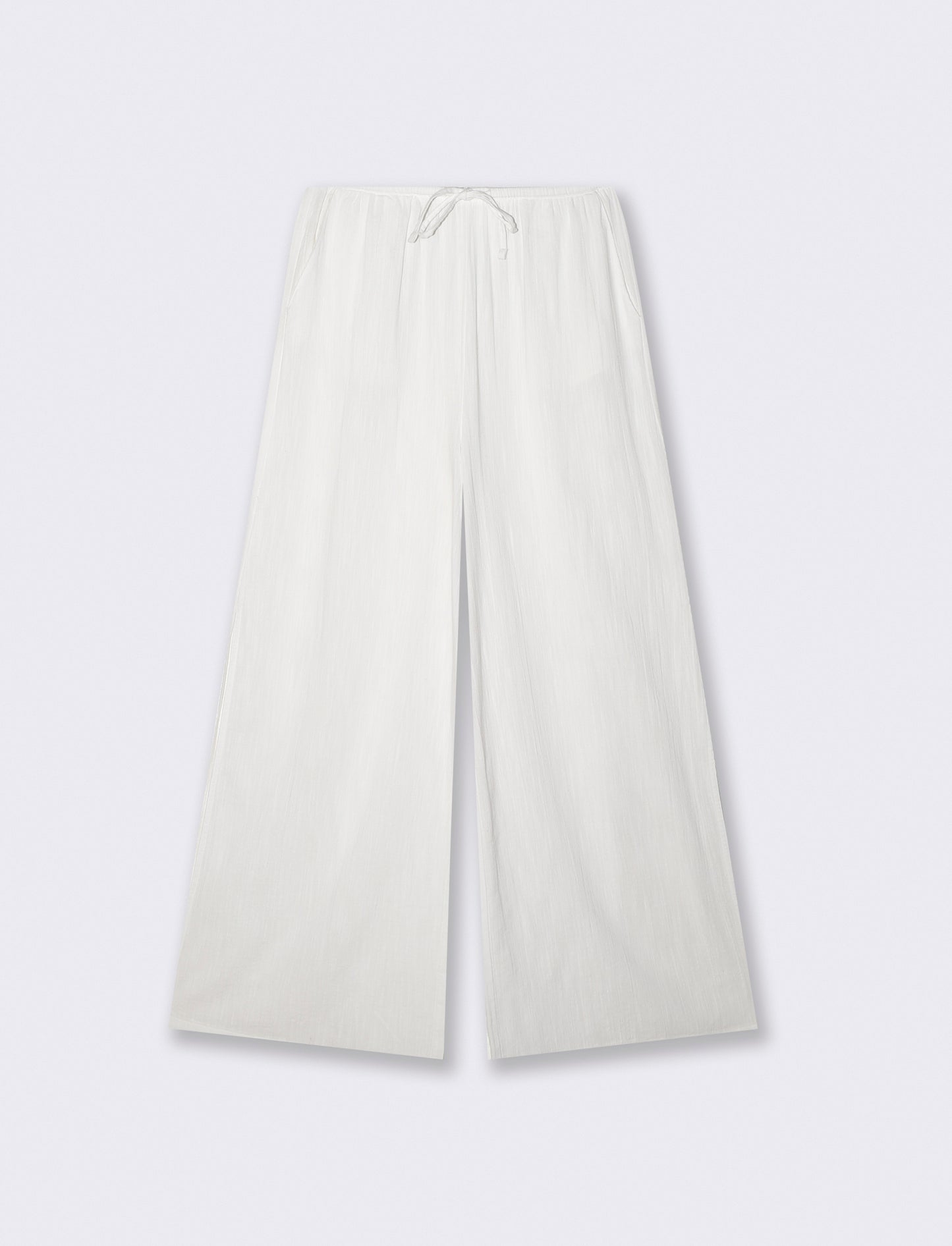 Introducing the perfect blend of comfort and style: wide-leg pants designed specifically for women. - White