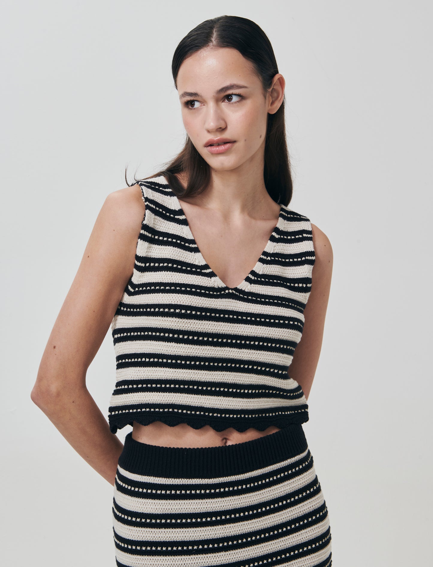 Introducing the Crochet Tank Top, a stylish and versatile addition to any woman's wardrobe. This sho - 