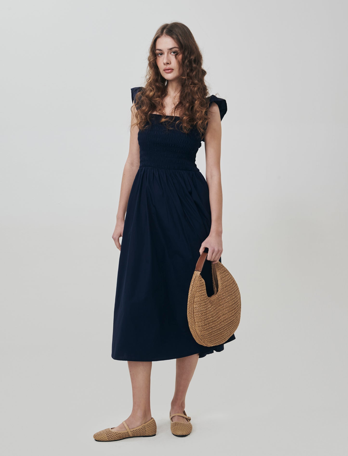 Abito lungo con busto smock e volant - Blu