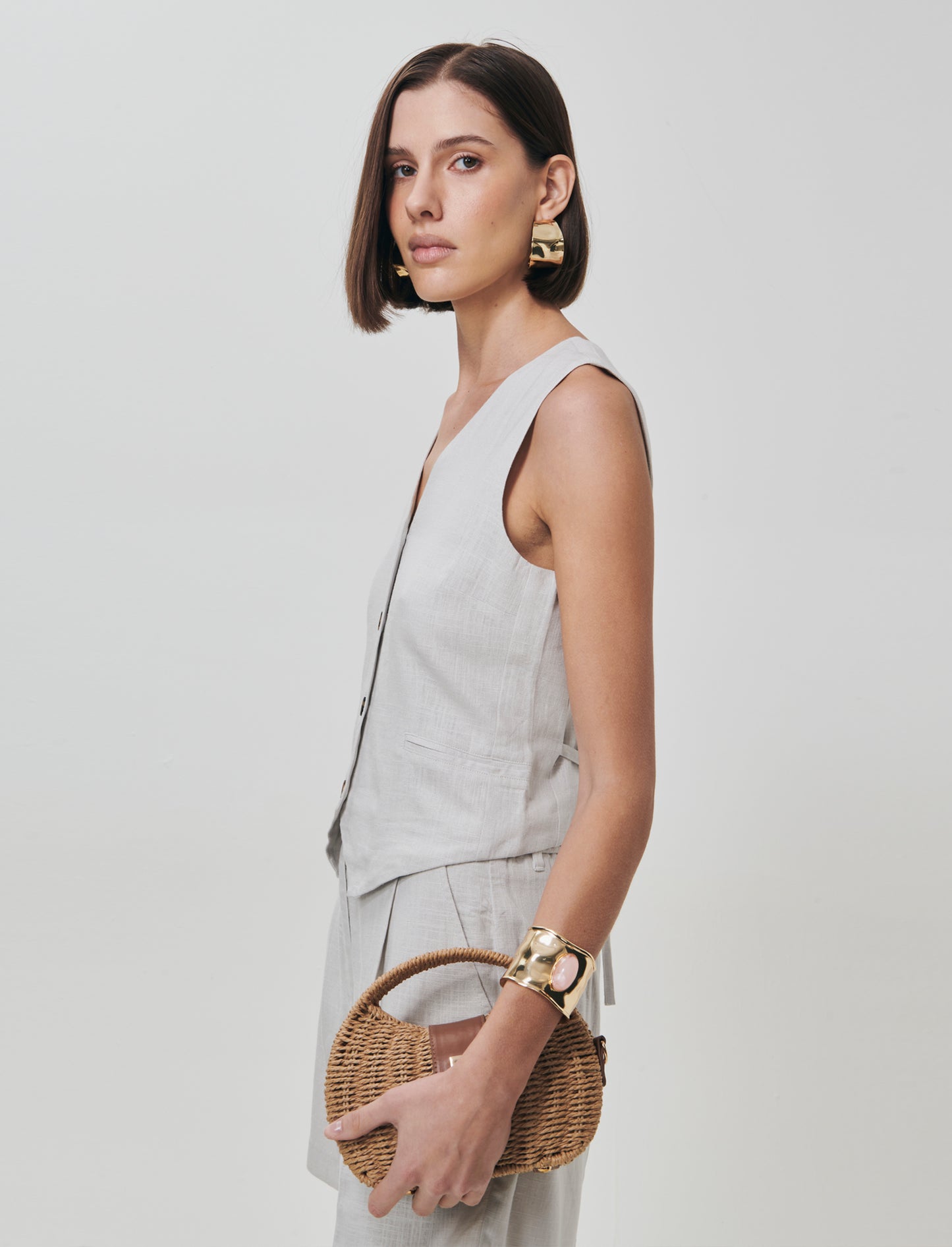 Gilet con tasche a taglio davanti - Sabbia