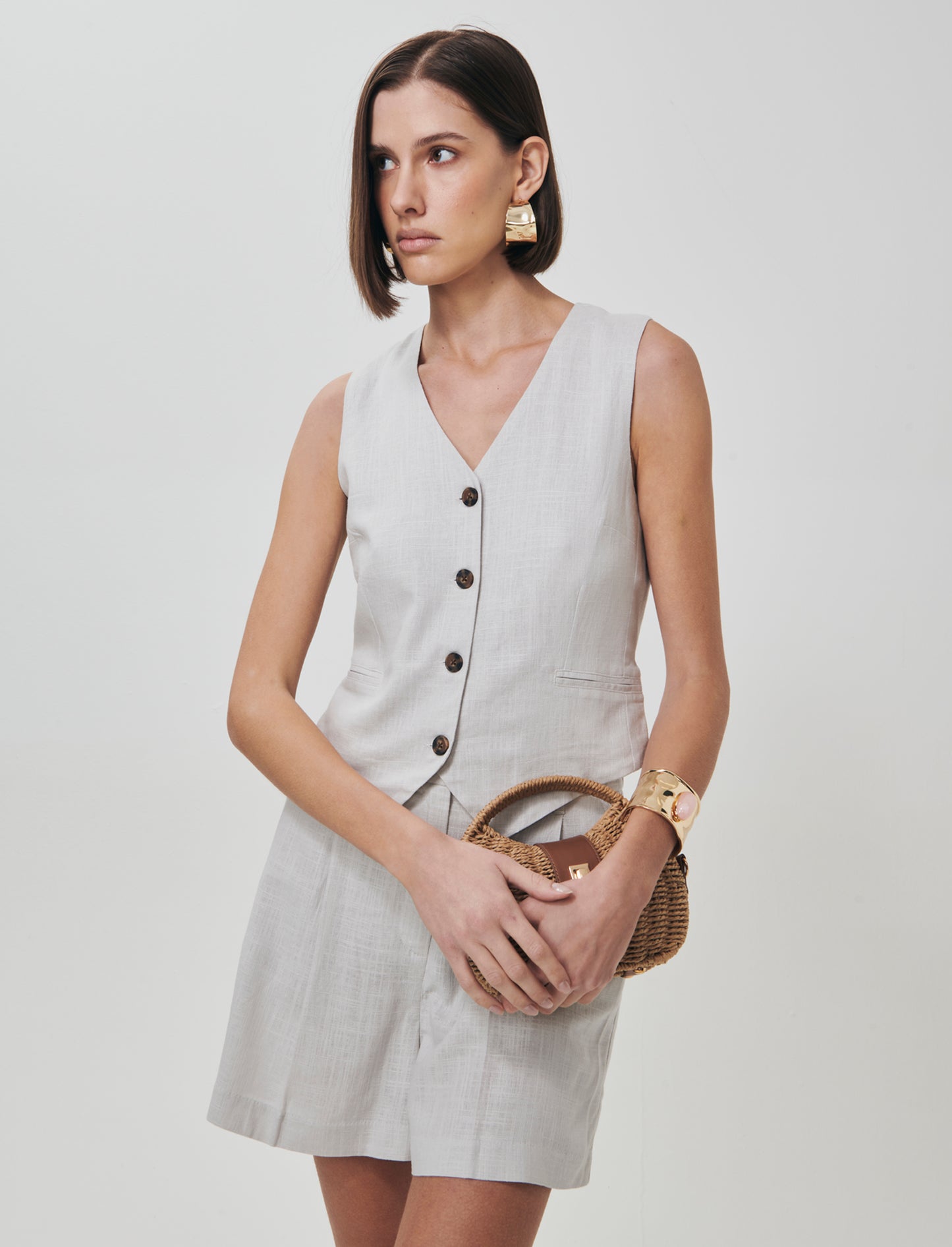 Gilet con tasche a taglio davanti - Sabbia