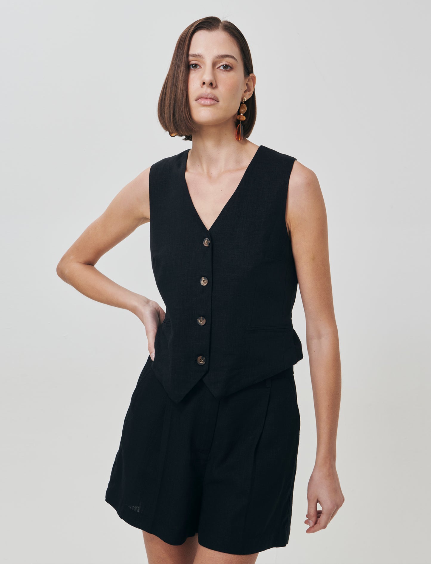 Gilet con tasche a taglio davanti - Nero