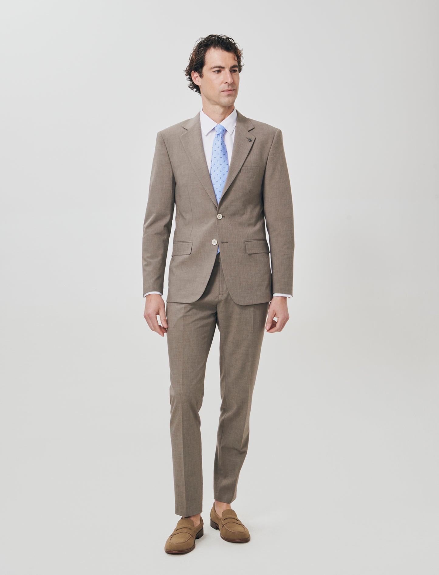 "Blazer formal fit micro structure melange in English translates to:

Formal fit blazer with micro m - Grey