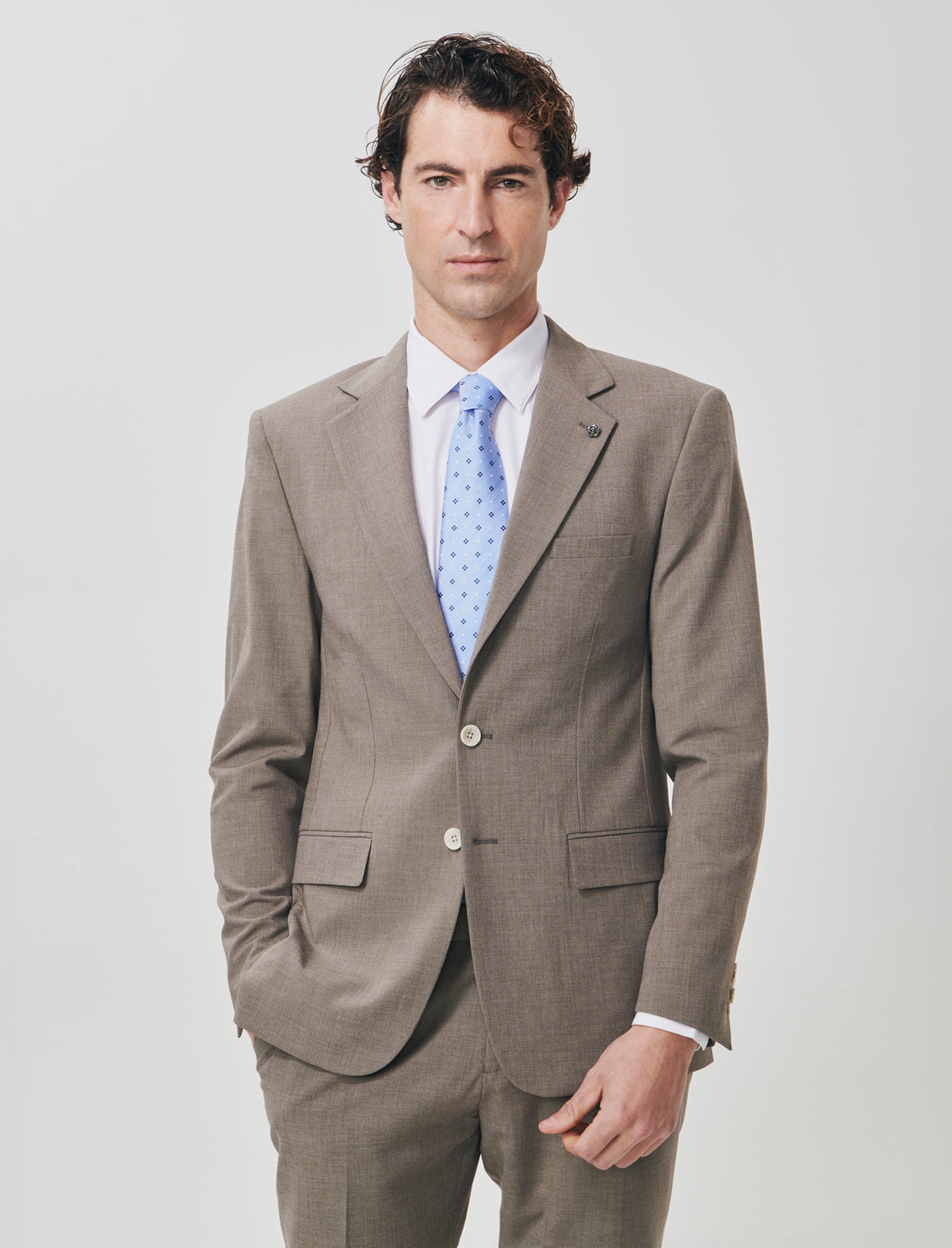 "Blazer formal fit micro structure melange in English translates to:

Formal fit blazer with micro m - Grey