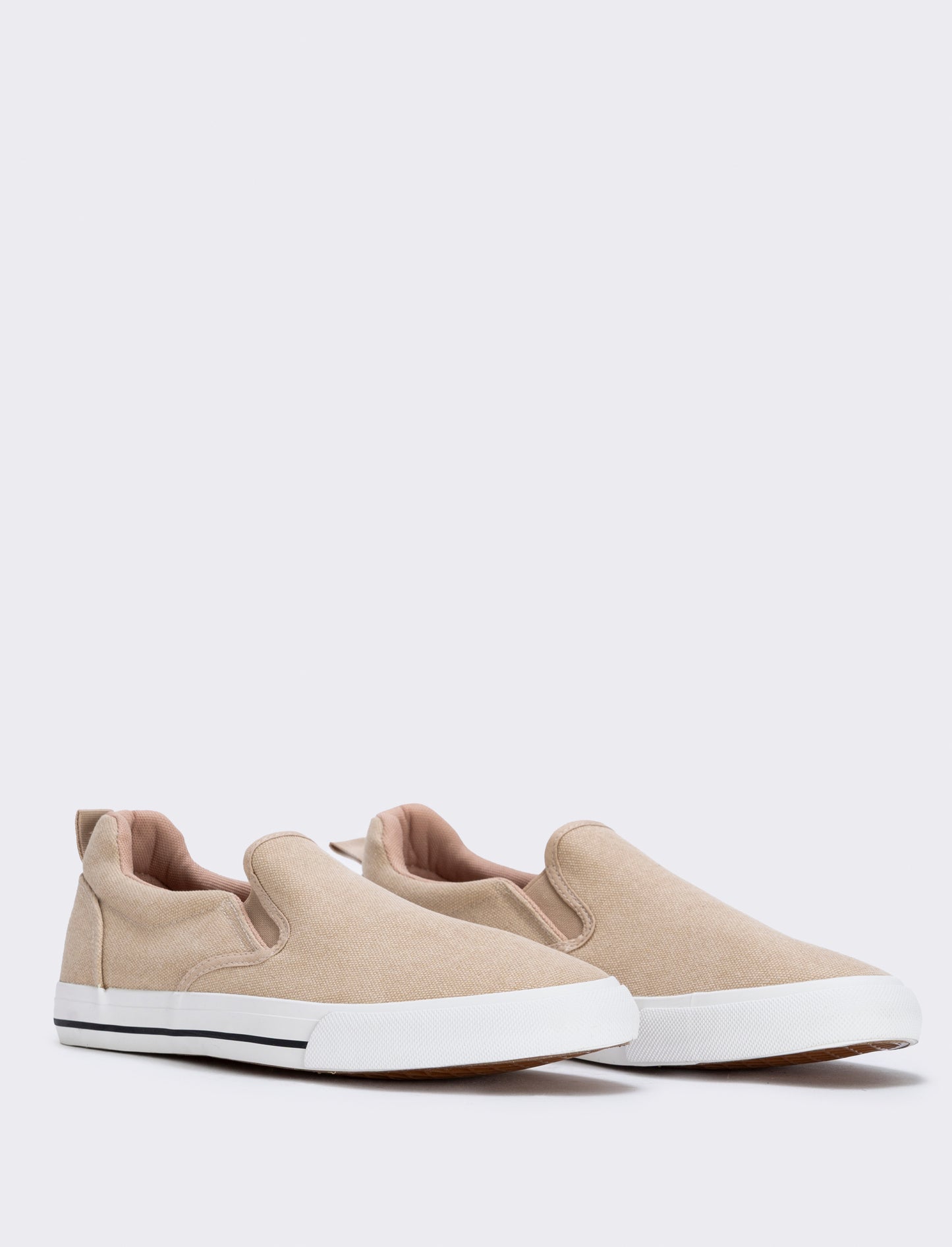 Canvas slip-ons available in two colors - Beige
