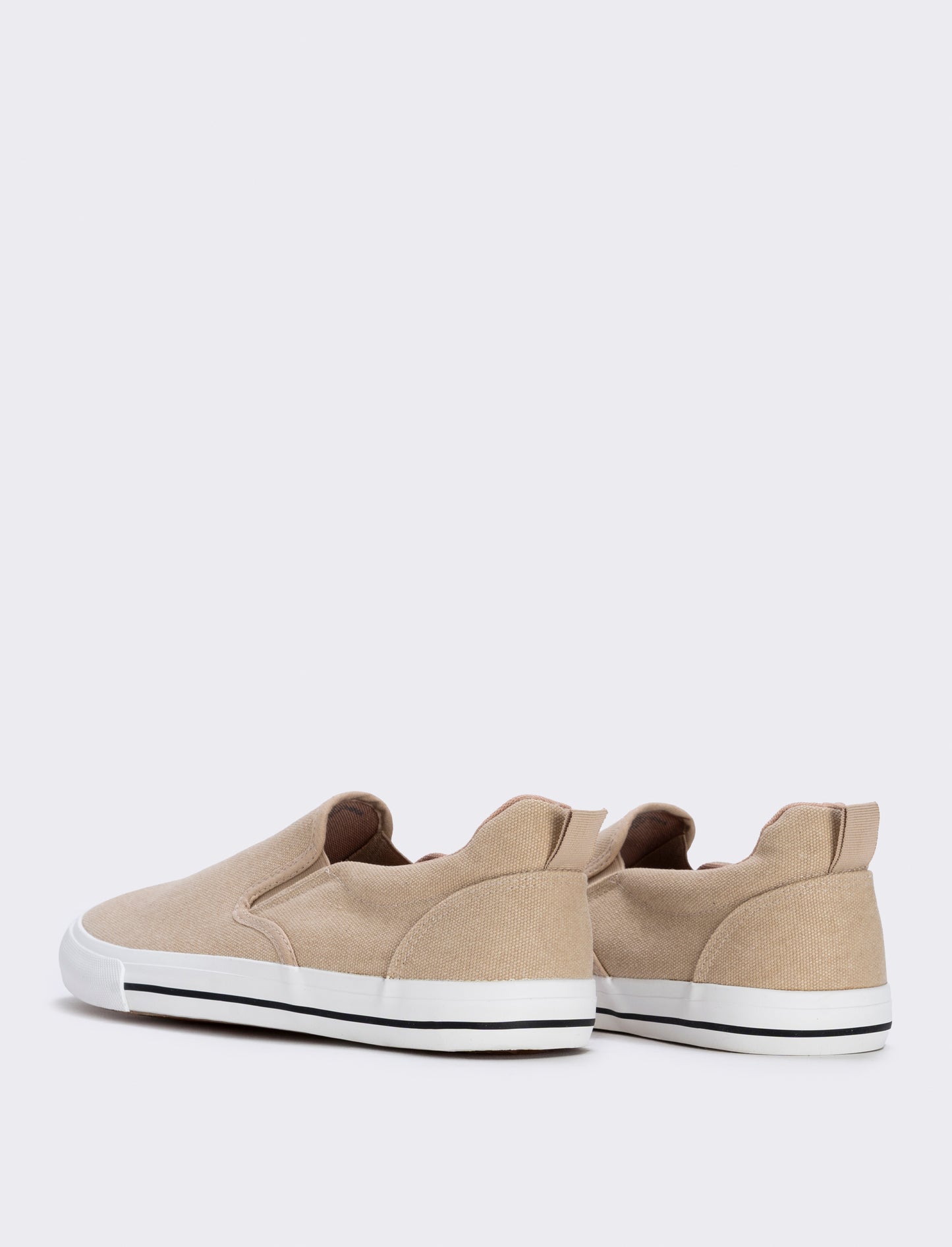 Canvas slip-ons available in two colors - Beige