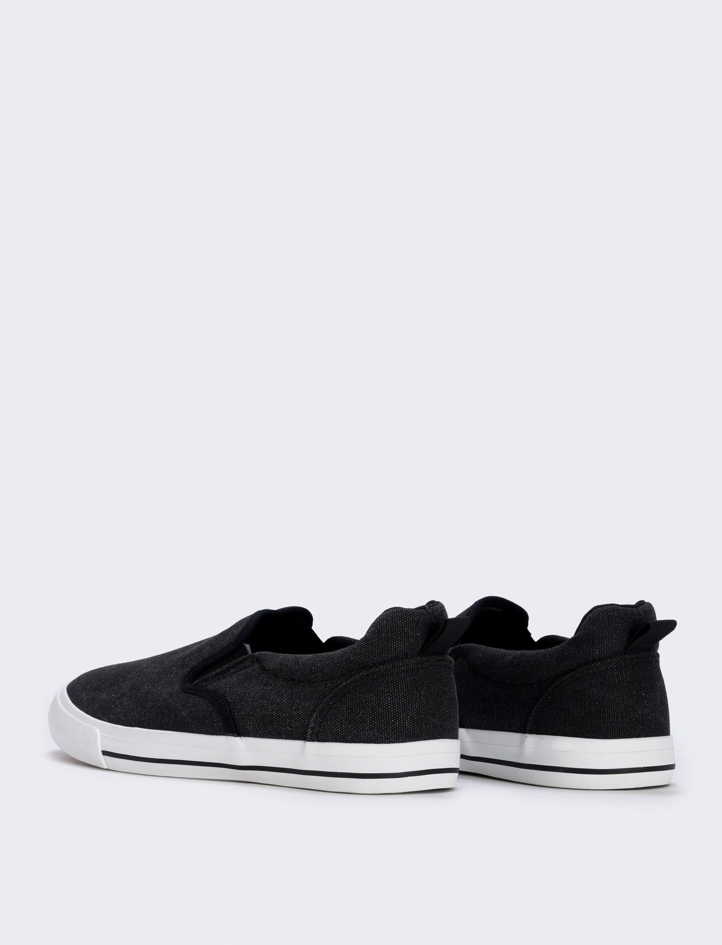 Canvas slip-ons available in two colors - Black