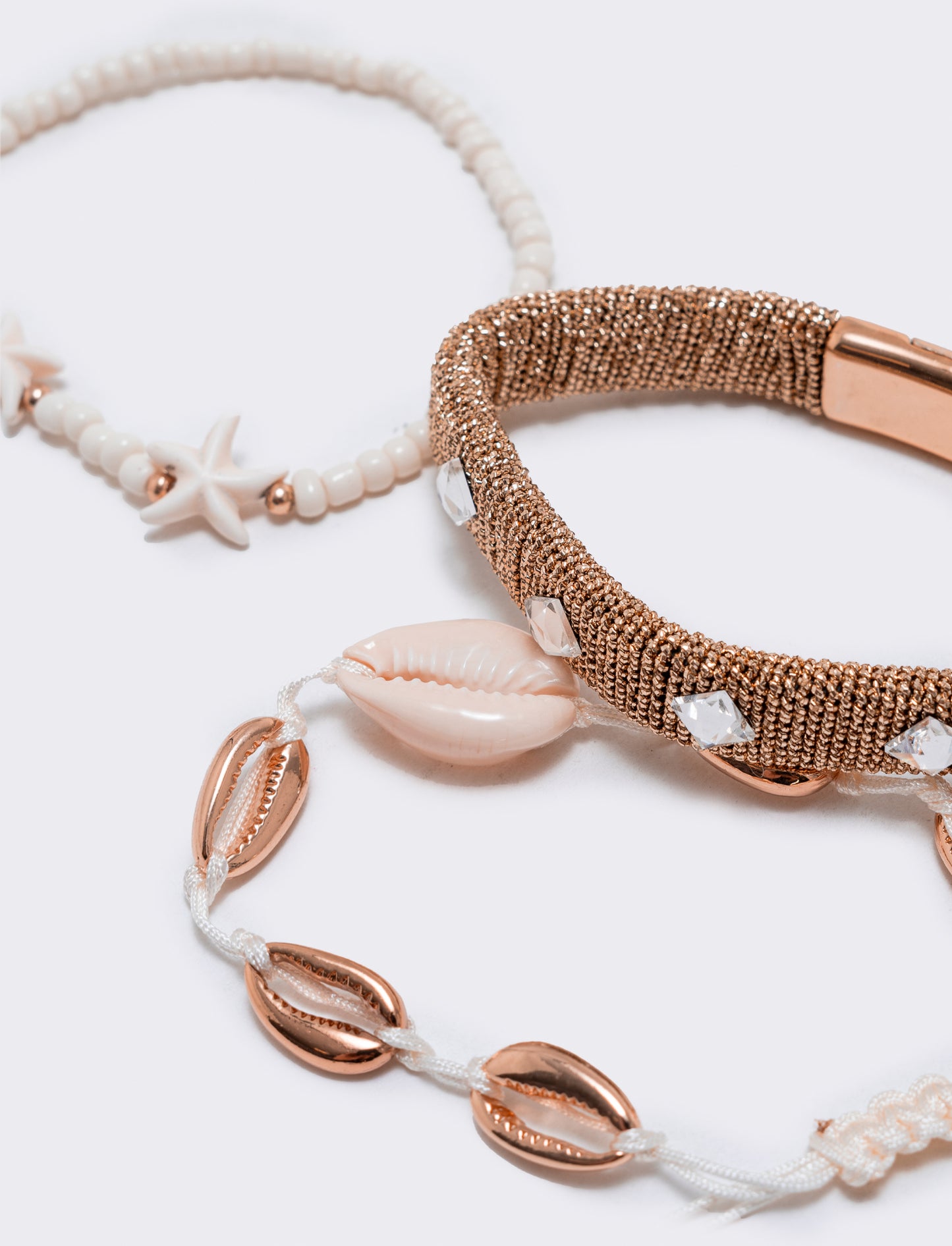 Card 3 bracciali conchiglie e stelle marine - Oro rosa