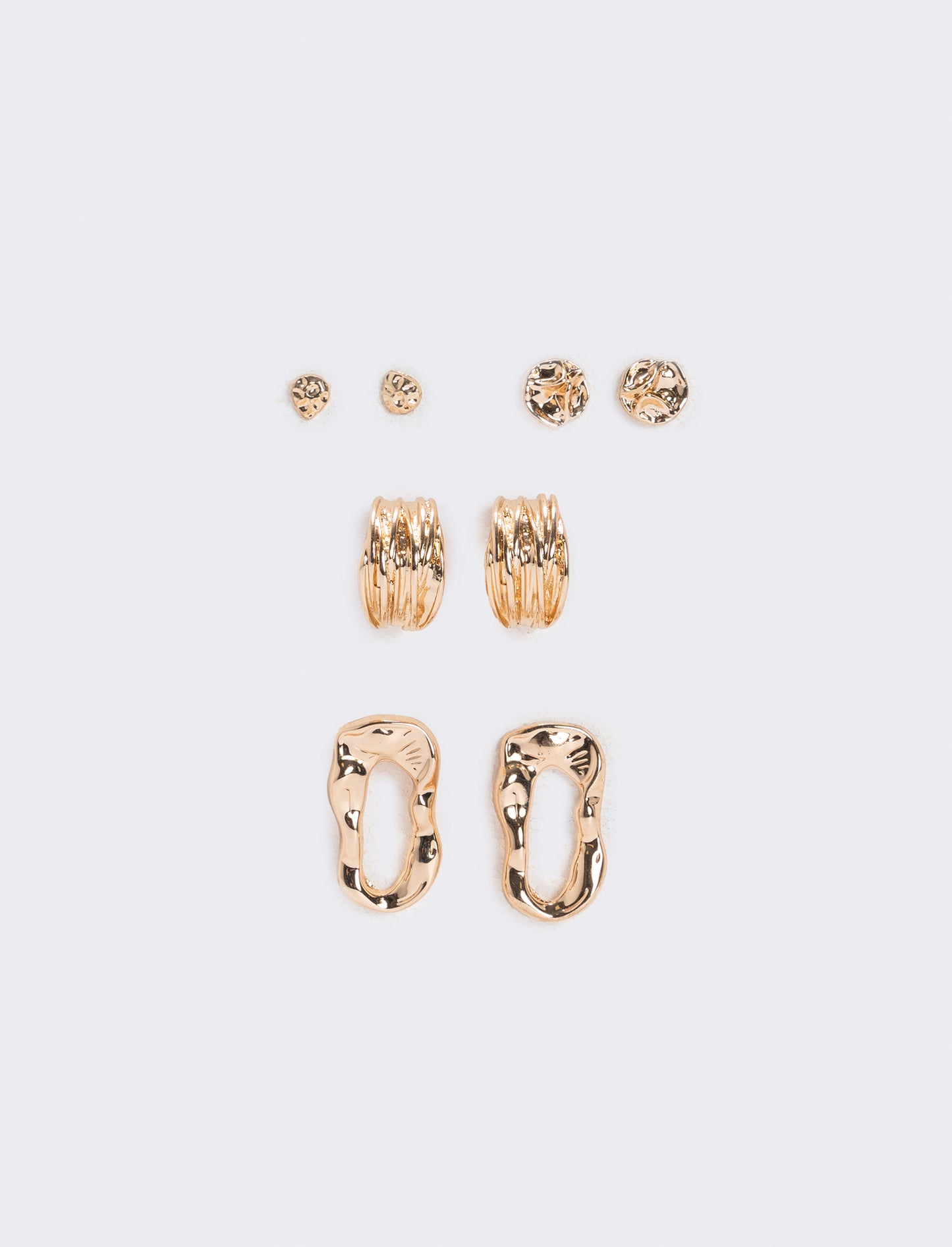Set of earrings in various shapes and sizes - Gold