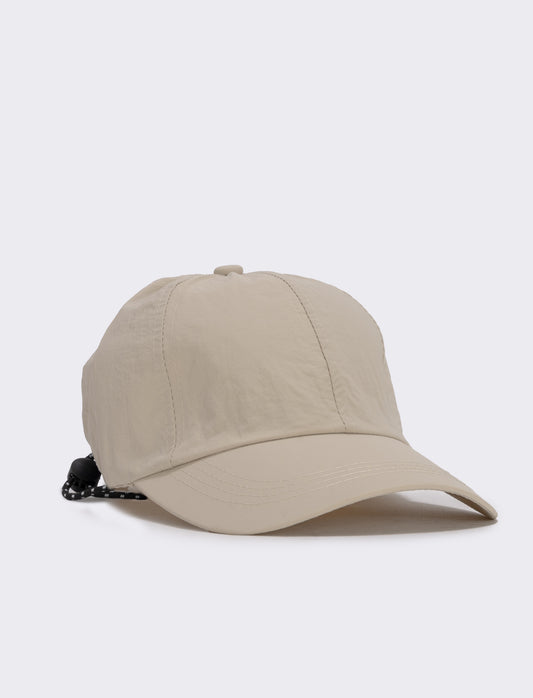 Baseball in tessuto tecnico con cordoncino - Beige