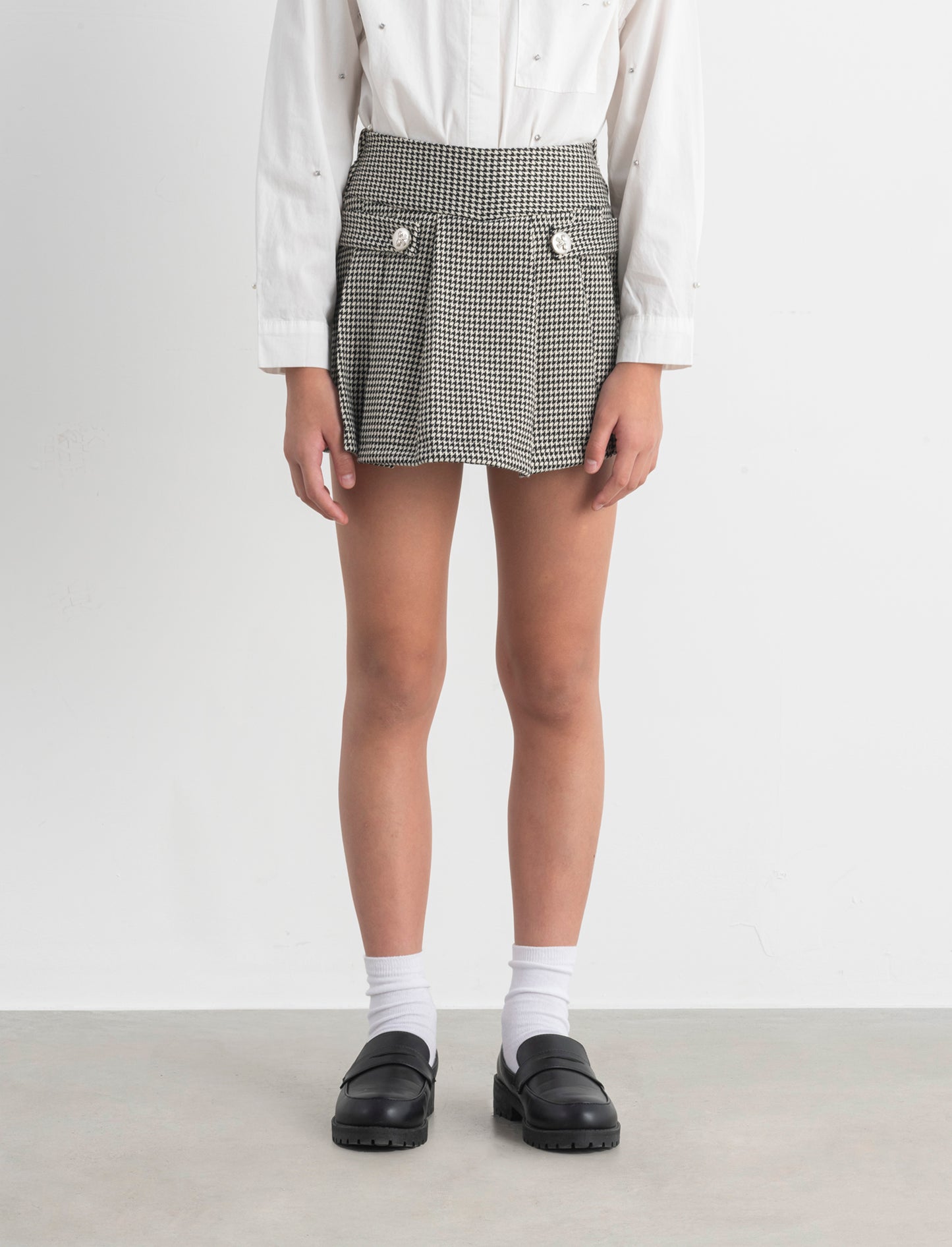 Short finta gonna in pied de poul. - Fantasia