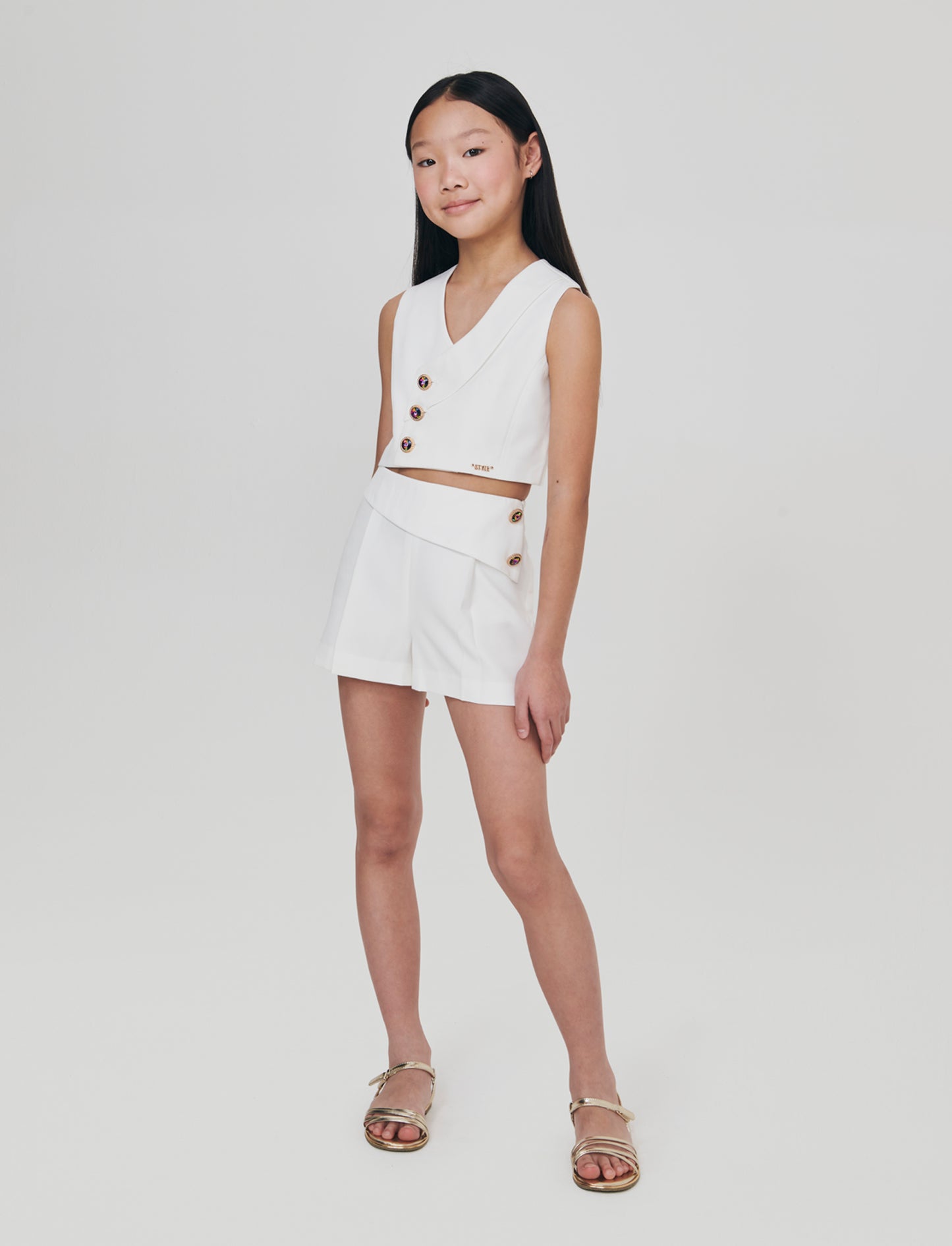 Elegant shorts with jewel buttons - White
