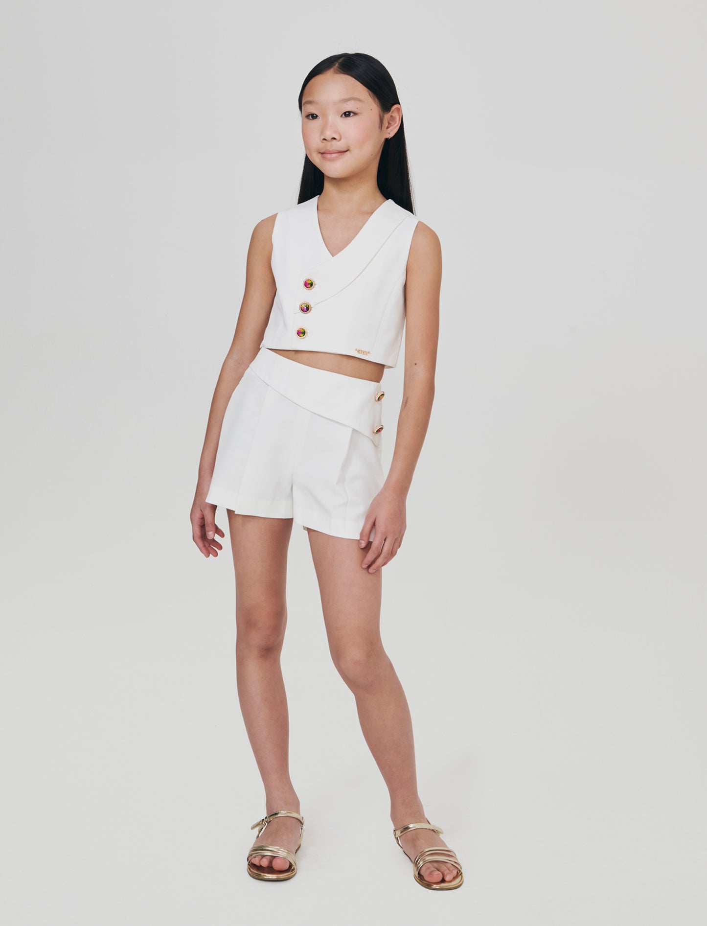 Gilet elegante con bottoni gioiello. - Bianco latte