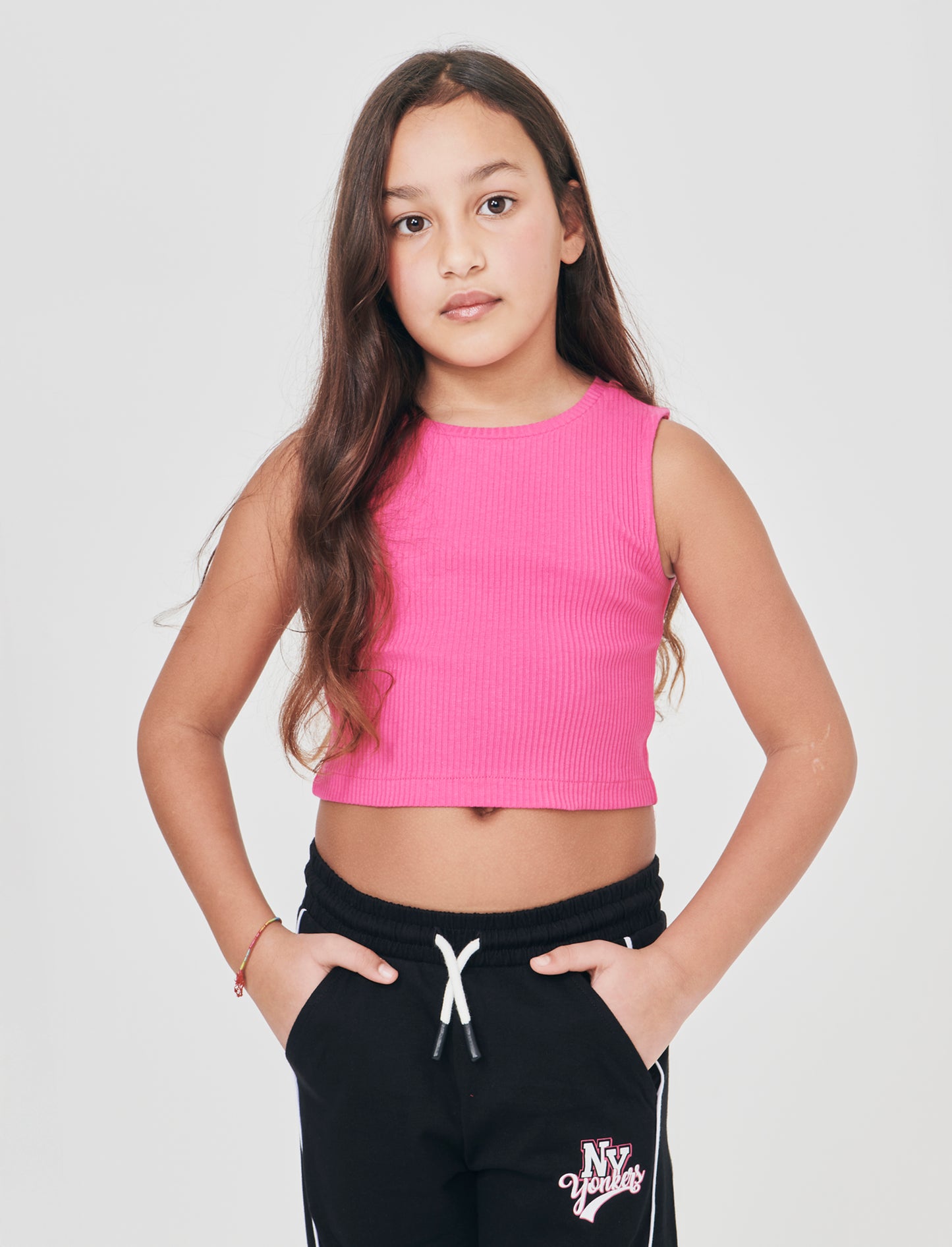 Top cropped in tessuto elastico girocollo - Fuxia