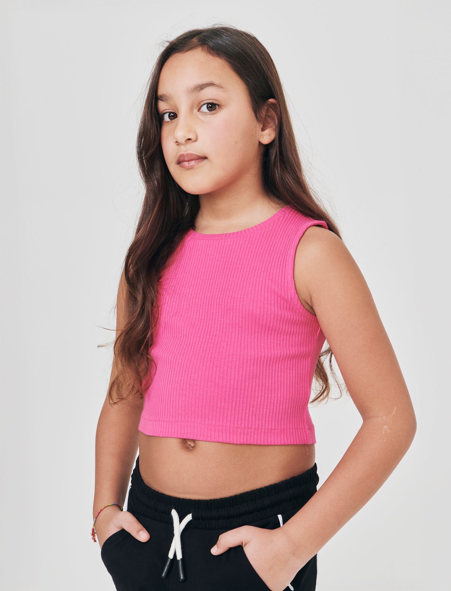 Top cropped in tessuto elastico girocollo - Fuxia