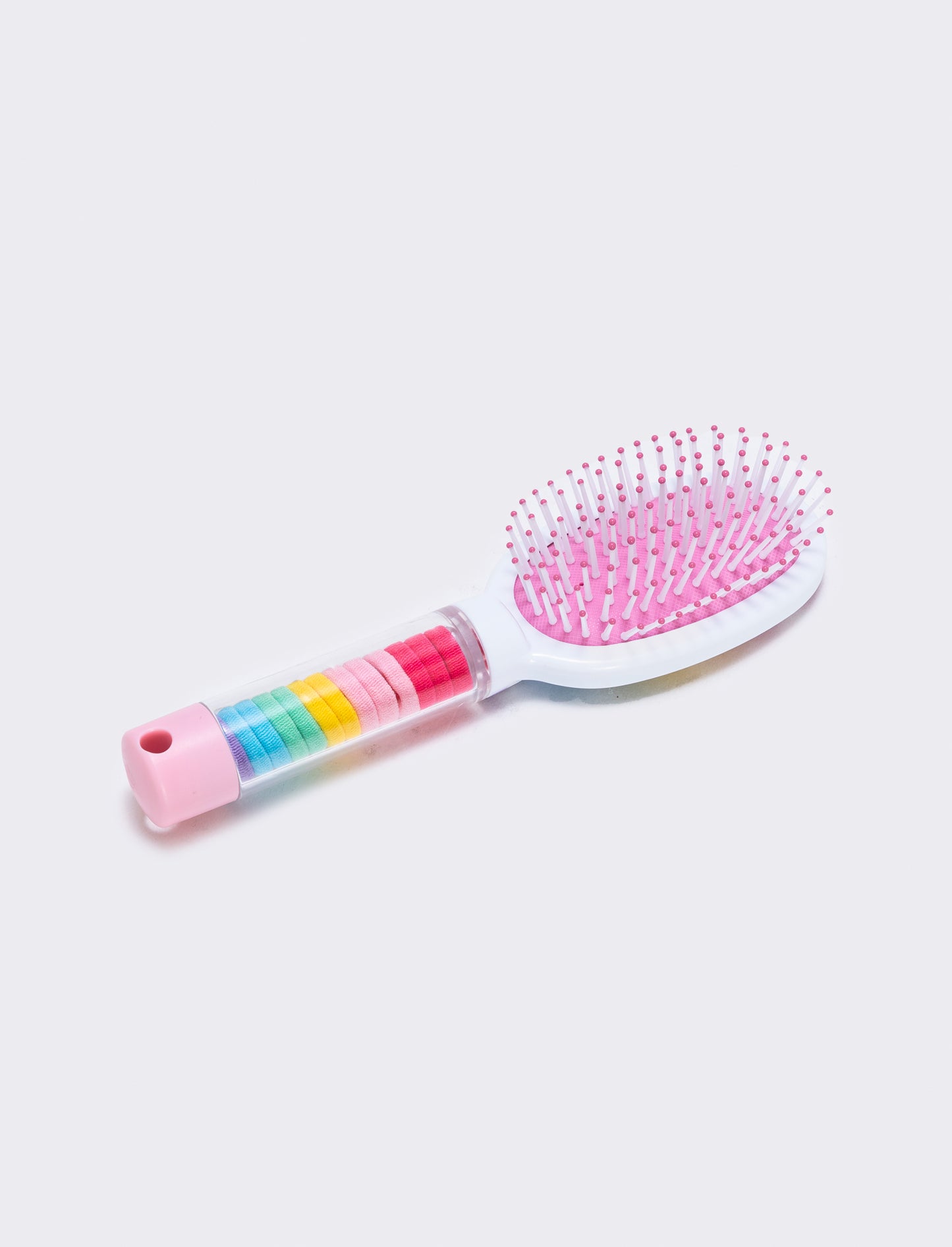 Brush with integrated tube and elastics - Multicolor