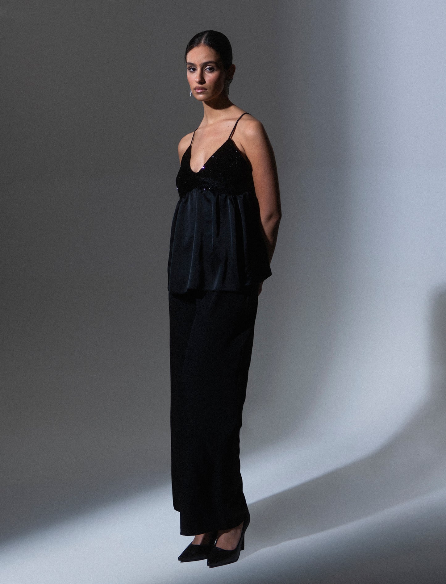 Top in paillettes e georgette - Nero