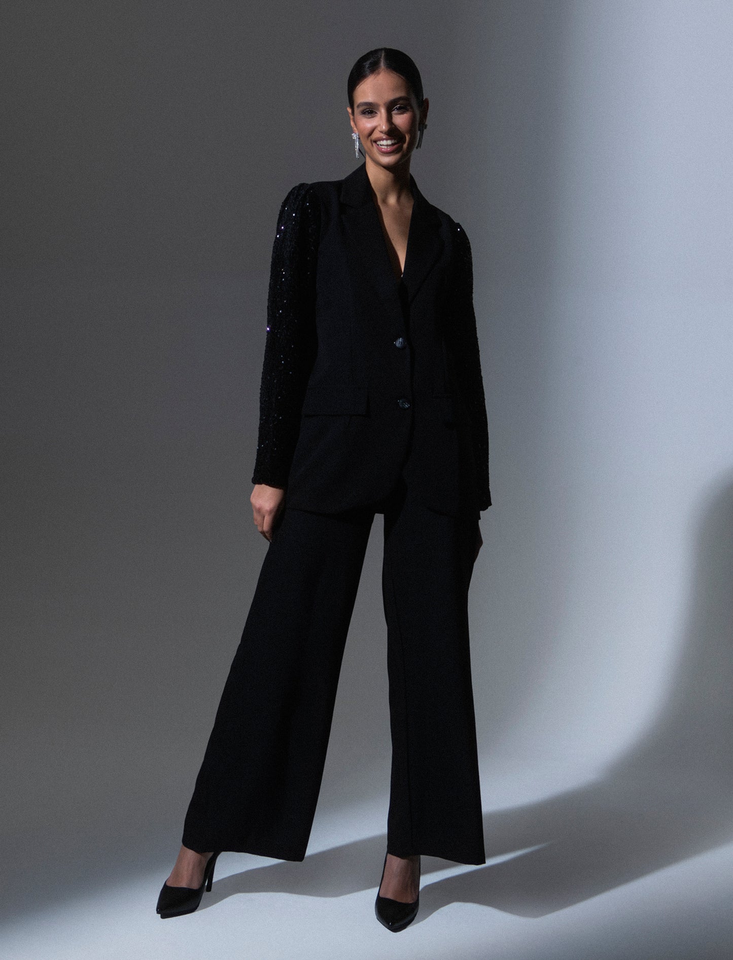 Giacca over con maniche in paillettes - Nero