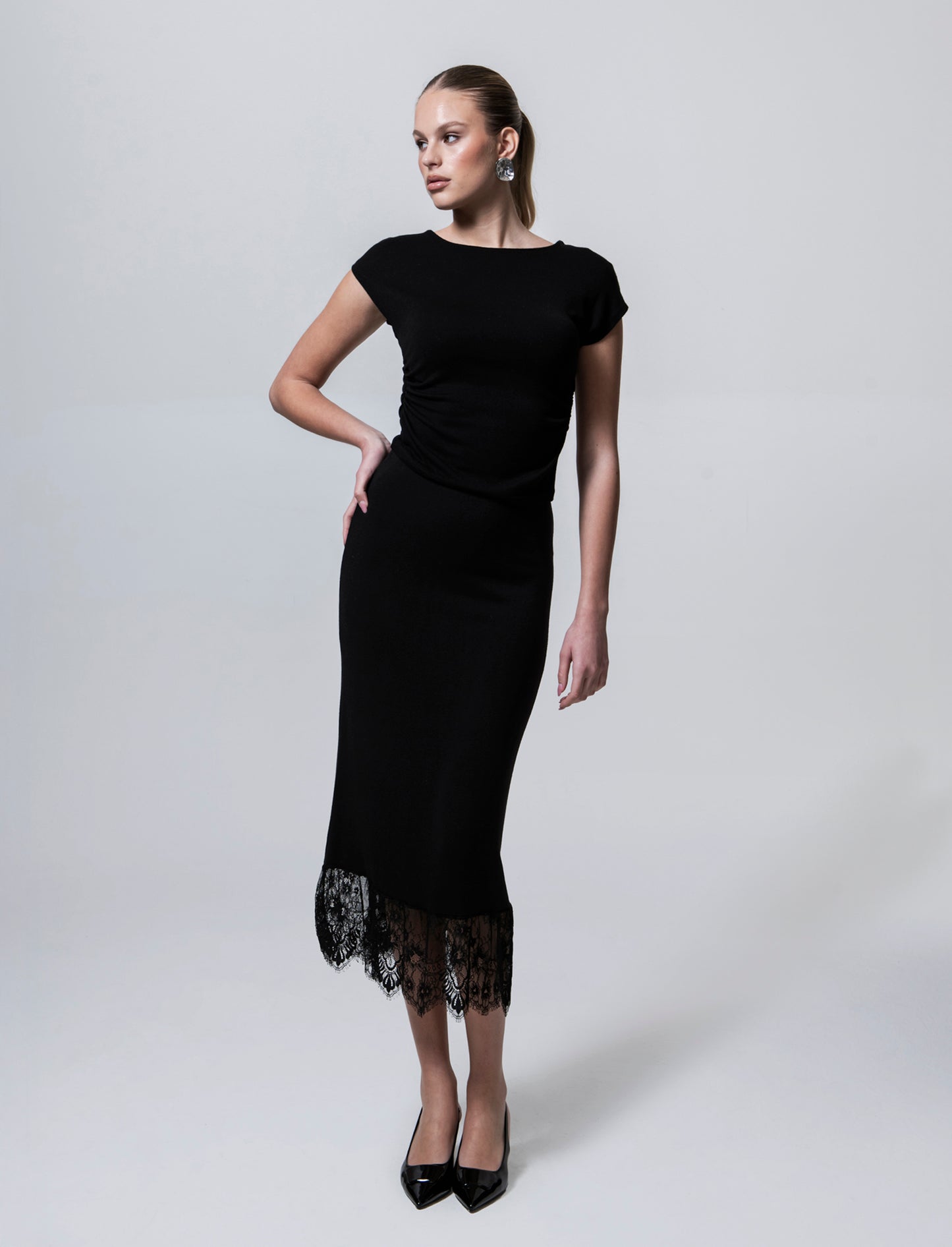 Gonna lunga in maglia con pizzo al fondo - Nero