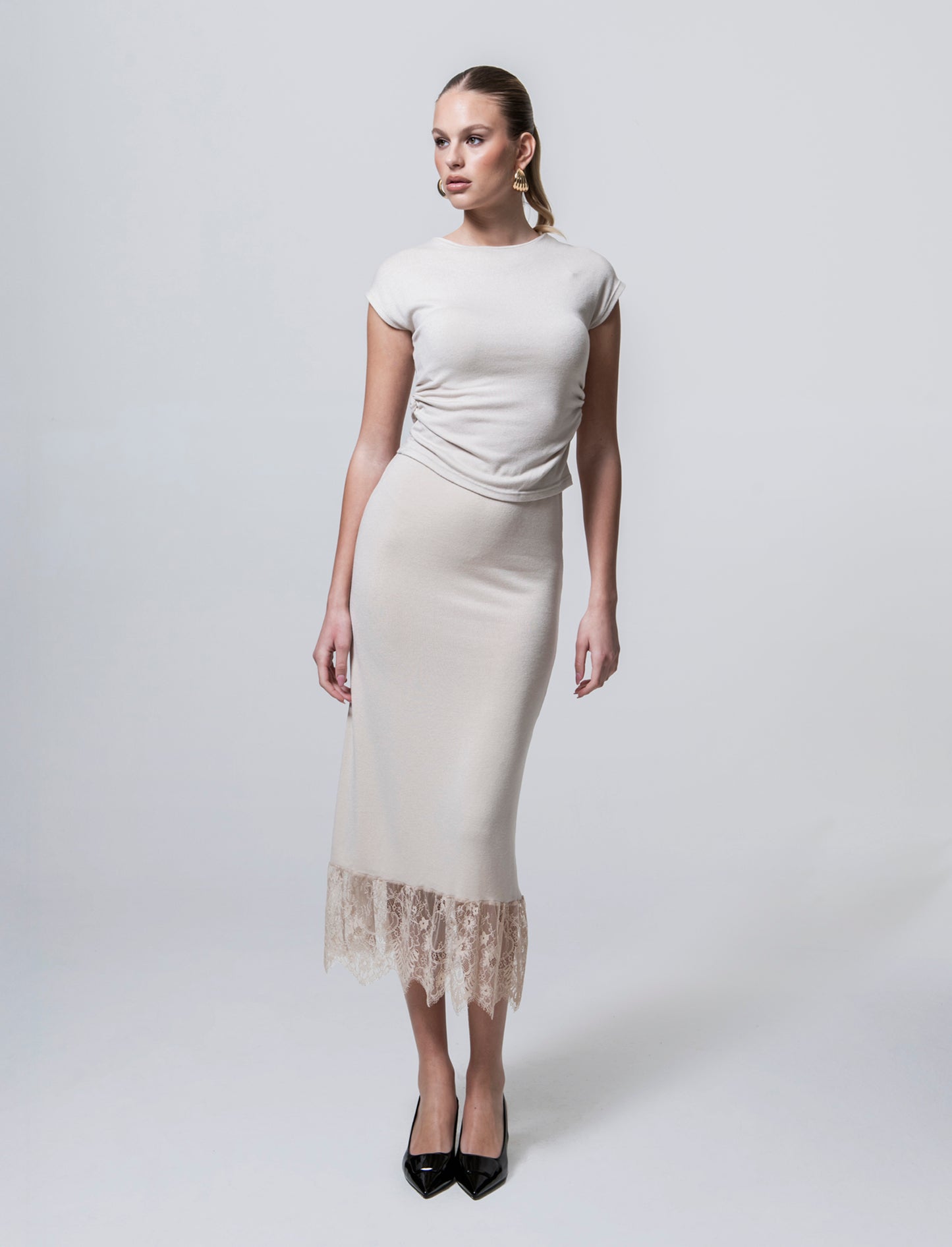 Gonna lunga in maglia con pizzo al fondo - Bianco panna
