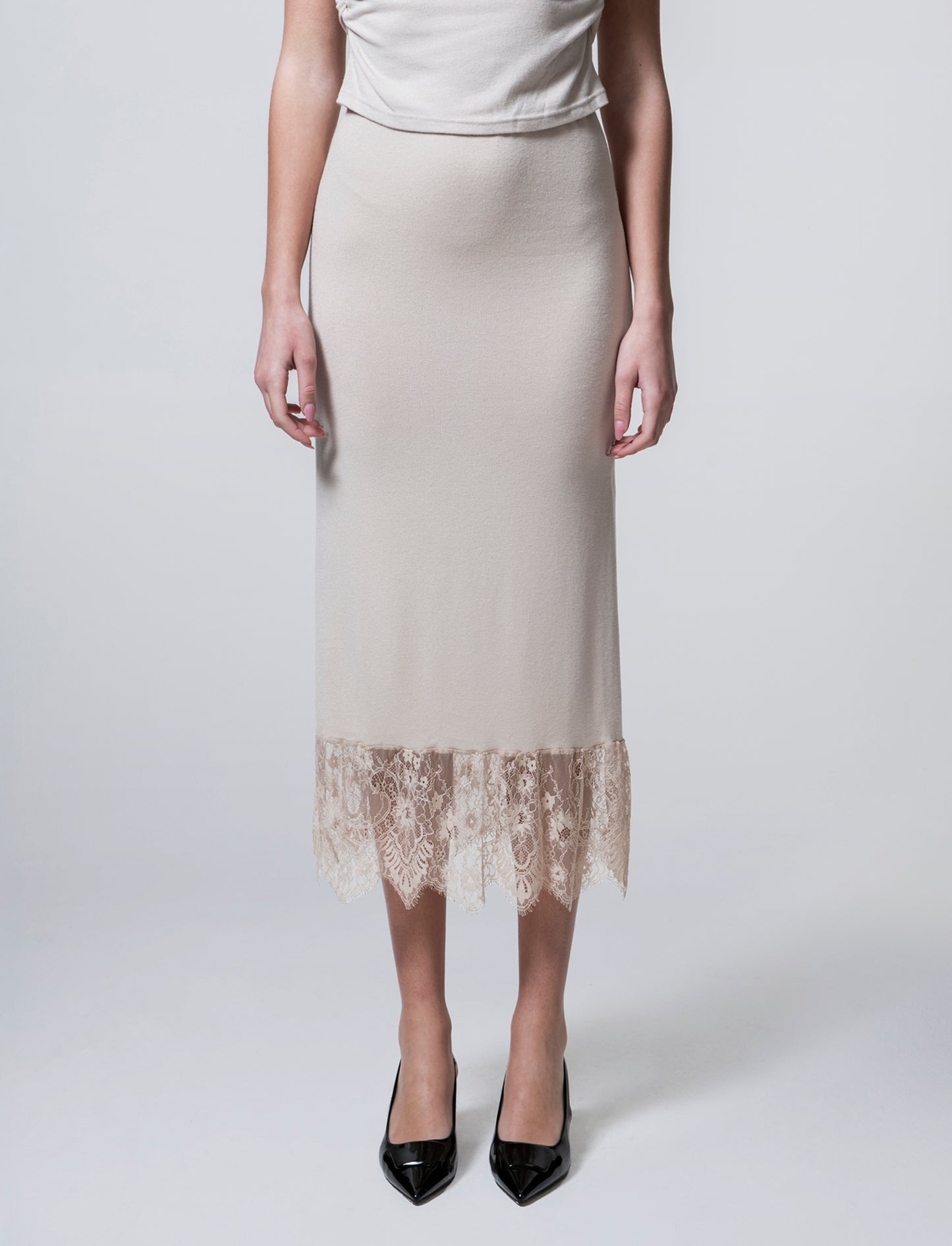 Gonna lunga in maglia con pizzo al fondo - Bianco panna