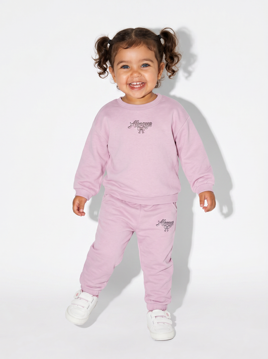 Jogger in cotone con fiocco e patch - Rosa polvere