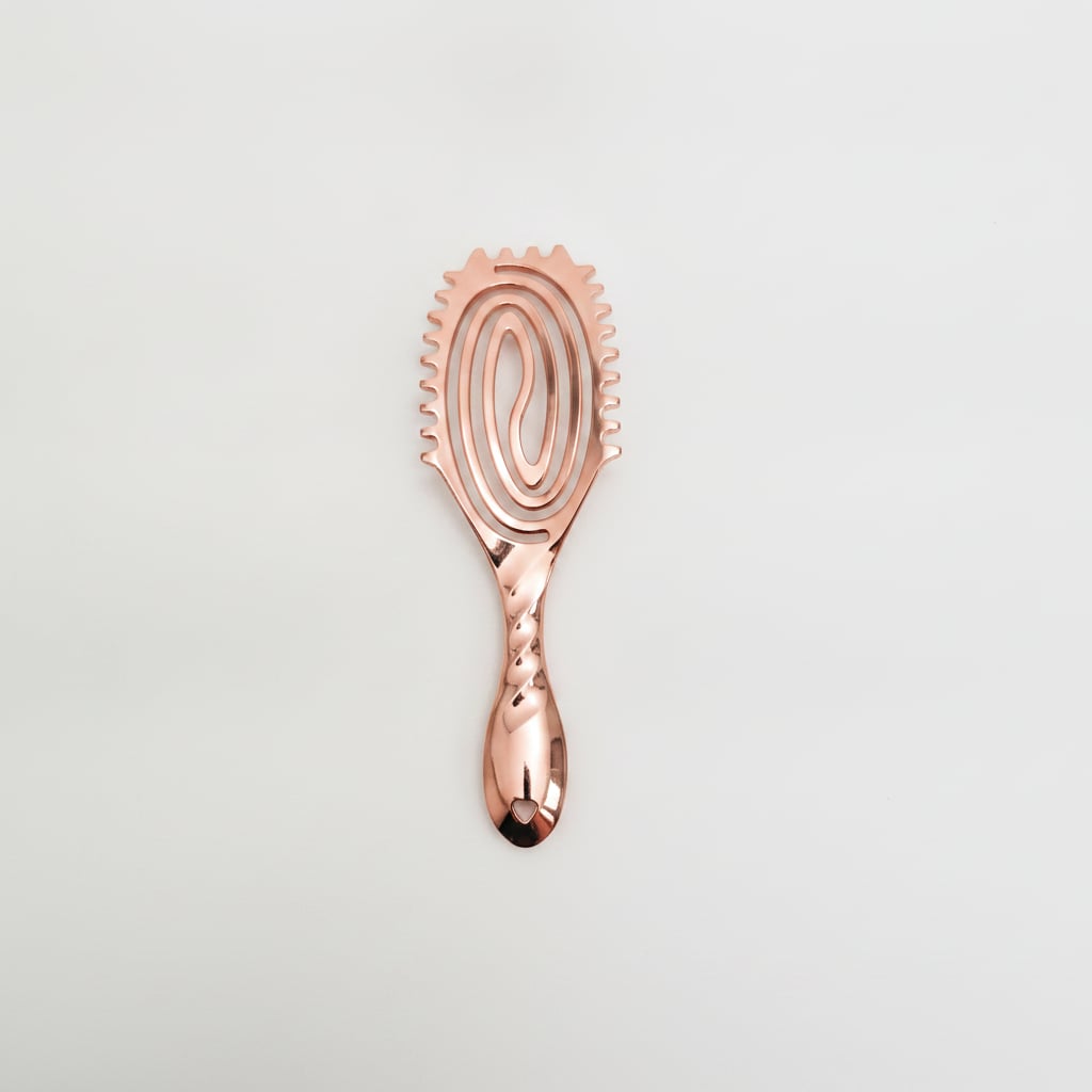 Spazzola con setole e dentini laterali - Rosa