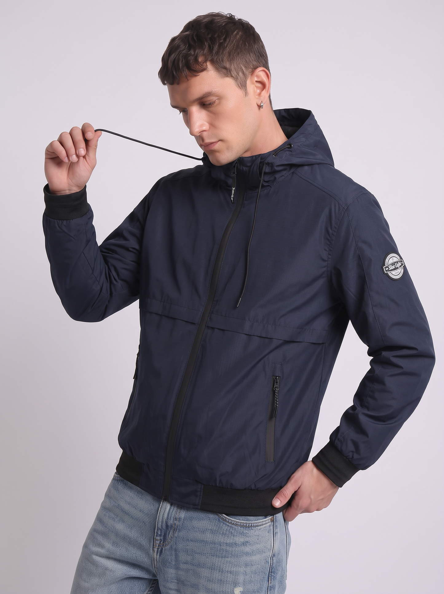 Giubbotto antivento con cappuccio regolabile - Blu