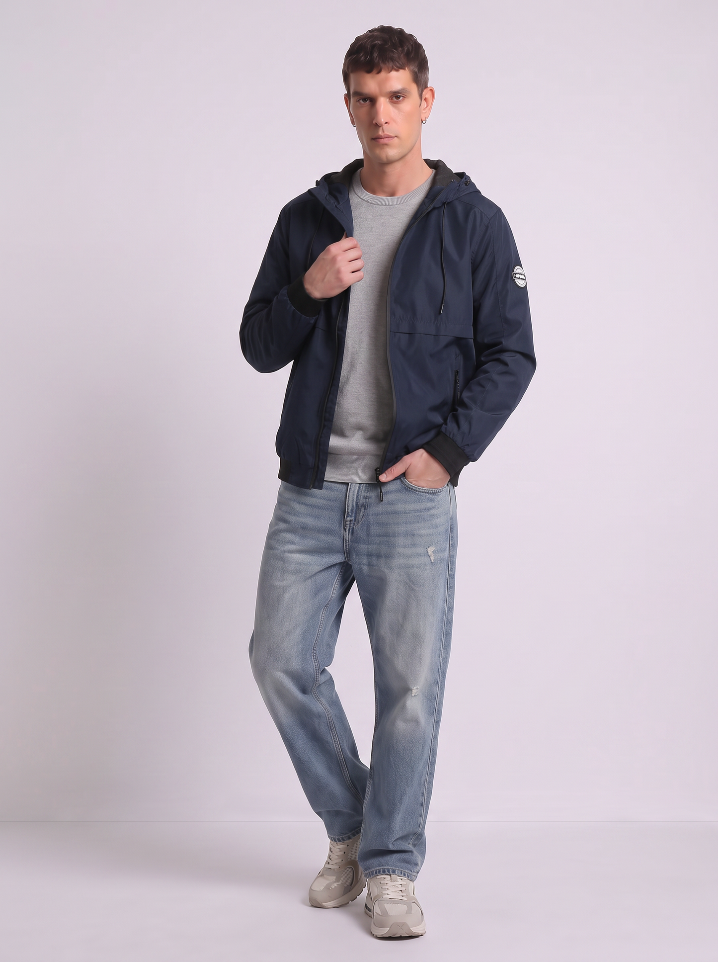 Giubbotto antivento con cappuccio regolabile - Blu